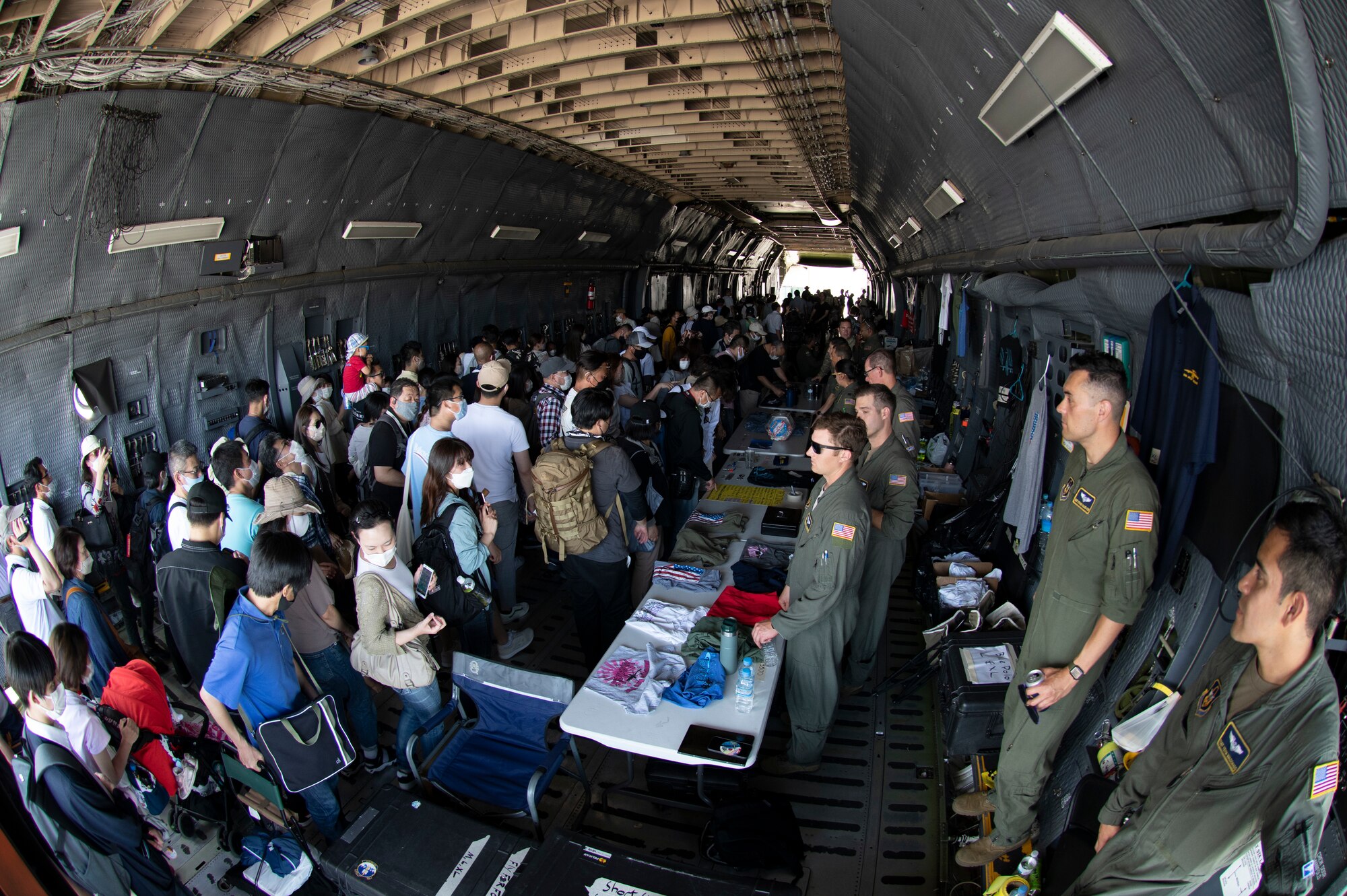 Attendees walk through a C-5M Super Galaxy assigned to the 312th Airlift Squadron from Travis Air Force Base, California, during Friendship Festival 2022, at Yokota Air Base, Japan, May 22. The two-day festival was an opportunity for visitors to learn more about the U.S. and Japan bilateral partnership, while strengthening the bonds between Yokota and the local communities. Yokota was able to host the event with the support of Japanese Self-Defense Force, sister services and the local community. (U.S. Air Force photo by Tech. Sgt. Joshua Edwards)
