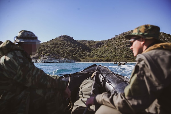 U.S. Marine Corps Cpl. Michael Earl, right, from Woodbridge, Virginia assigned to Task Force 61/2, participates in an amphibious training evolution with the Hellenic Special Forces during exercise Alexander the Great 22, Greece, May 9, 2022. Alexander the Great 22 strengthens interoperability and force readiness between the U.S., Greece, and Allied nations, enhancing strategic defense and partnership while promoting security and stability in the region. (U.S. Marine Corps photo by Lance Cpl. Emma Gray)