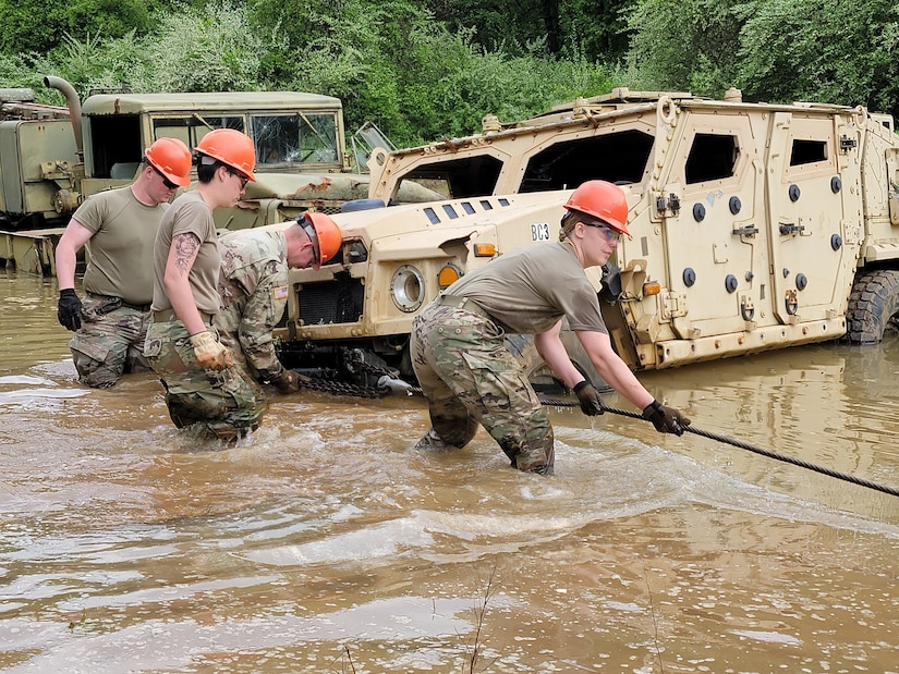 Soldiers with the Army active, Reserve, and National Guard components attend a vehicle recovery course at the Regional Training Site-Maintenance (RTS-M), 177th Regiment, Regional Training Institute, Fort Custer Training Center, Augusta, Michigan, May 19, 2022. With 13 training centers available throughout the Army, Michigan’s RTS-M runs approximately 24 classes and averages 396 students per year. The RTS-M has added unique training to the wheeled vehicle recovery course which includes land navigation to locate disabled vehicles. (U.S. Air National Guard photo by Master Sgt. David Eichaker)