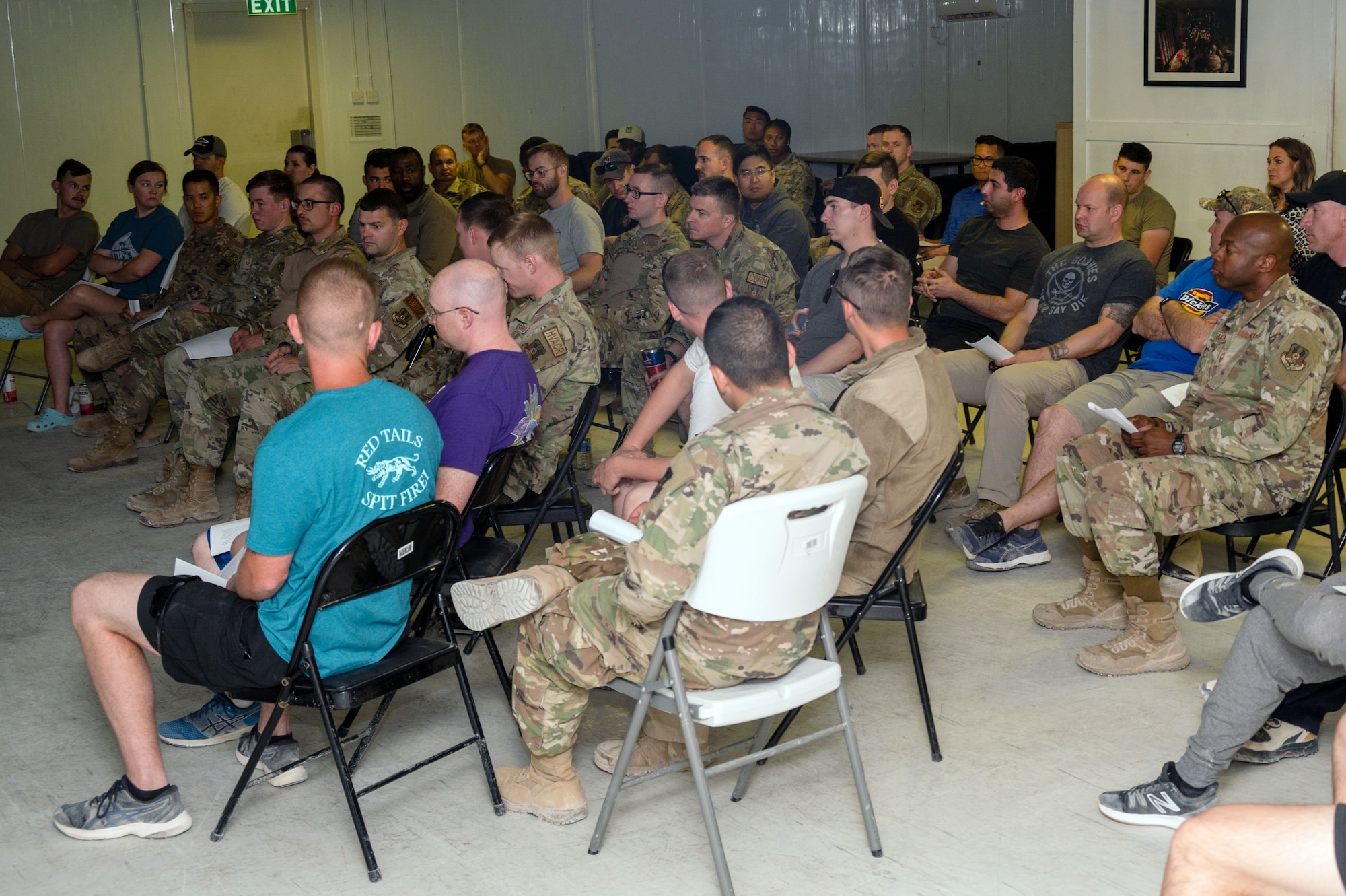 332d Air Expeditionary Wing Airmen attend a Red Tails University class at an undisclosed location in Southwest Asia, May 21, 2022. The curriculum options RTU provides is meant to encourage 332d AEW Red Tails to seek learning and personal growth opportunities beyond textbook-style professional military education. (U.S. Air Force photo by Tech. Sgt. Lauren M. Snyder)