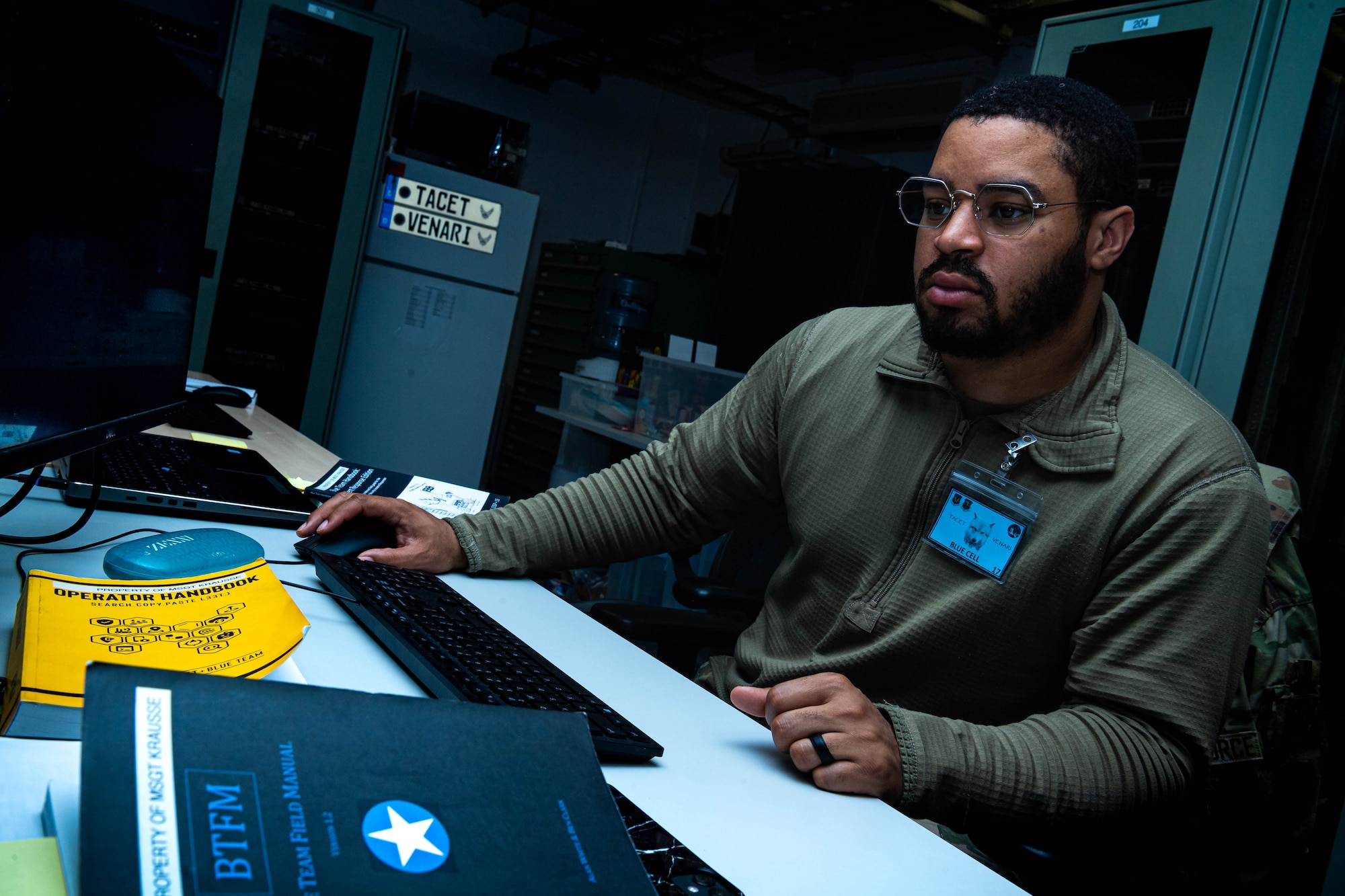 U.S. Air Force Staff Sgt. Kevin Green, 52nd Communications Squadron defense team supervisor assigned to Spangdahlem Air Base, Germany, verifies the integrity of processes during exercise Tacet Venari at Ramstein Air Base, Germany, May 12, 2022. Tacet Venari is a cyber exercise where participants have hands-on experience in cyber warfare operations. The exercise provides Airmen the opportunity to identify, detect and respond to cyber threats. (U.S. Air Force photo by Airman 1st Class Jared Lovett)