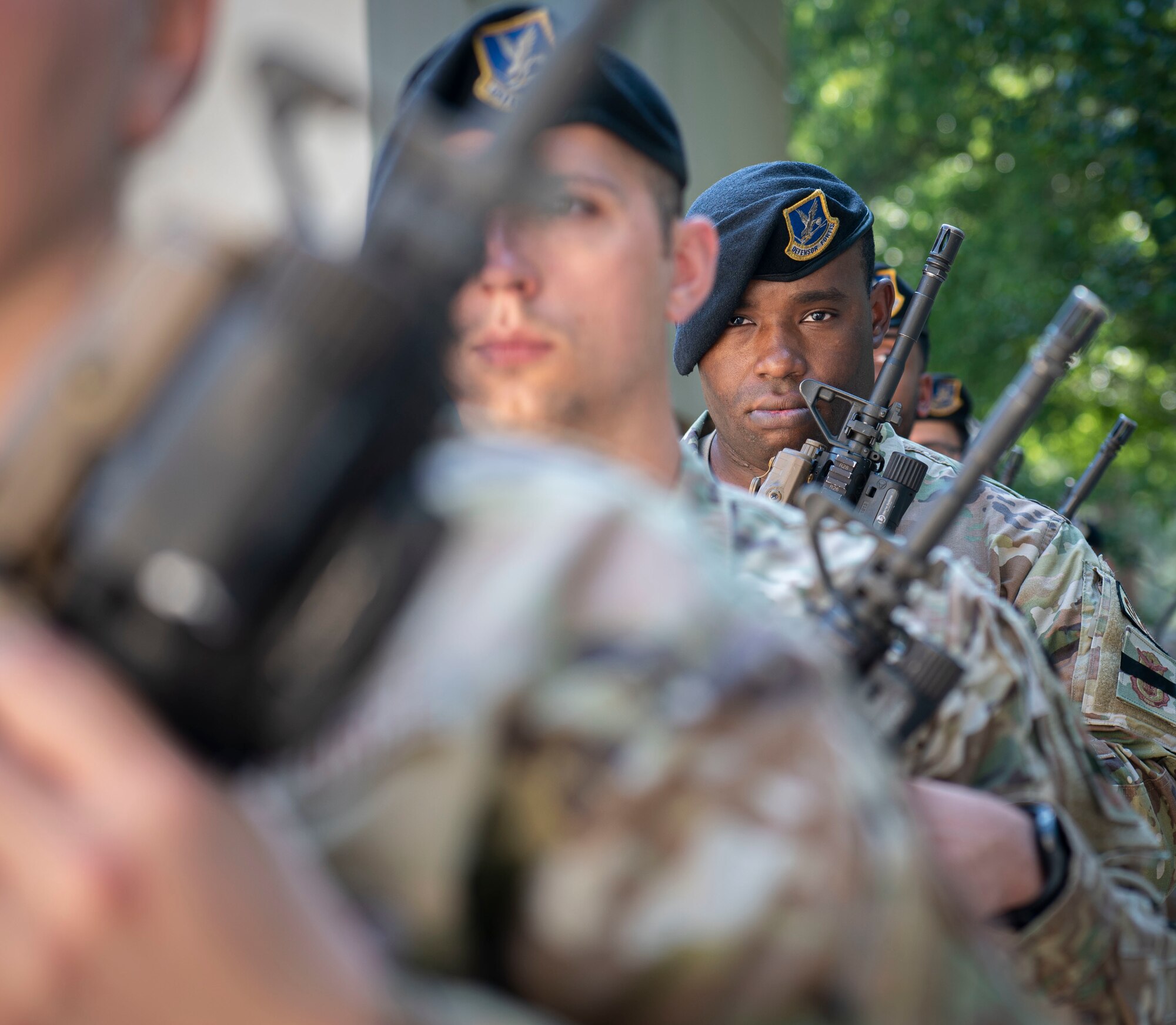 Airmen assigned to the 4th Security Forces Squadron prepare to fire an M-16 rifle during the National Police Week closing ceremony at Seymour Johnson Air Force Base, North Carolina, May 20, 2022. Members of the 4th SFS hosted several events in honor of National Police Week.