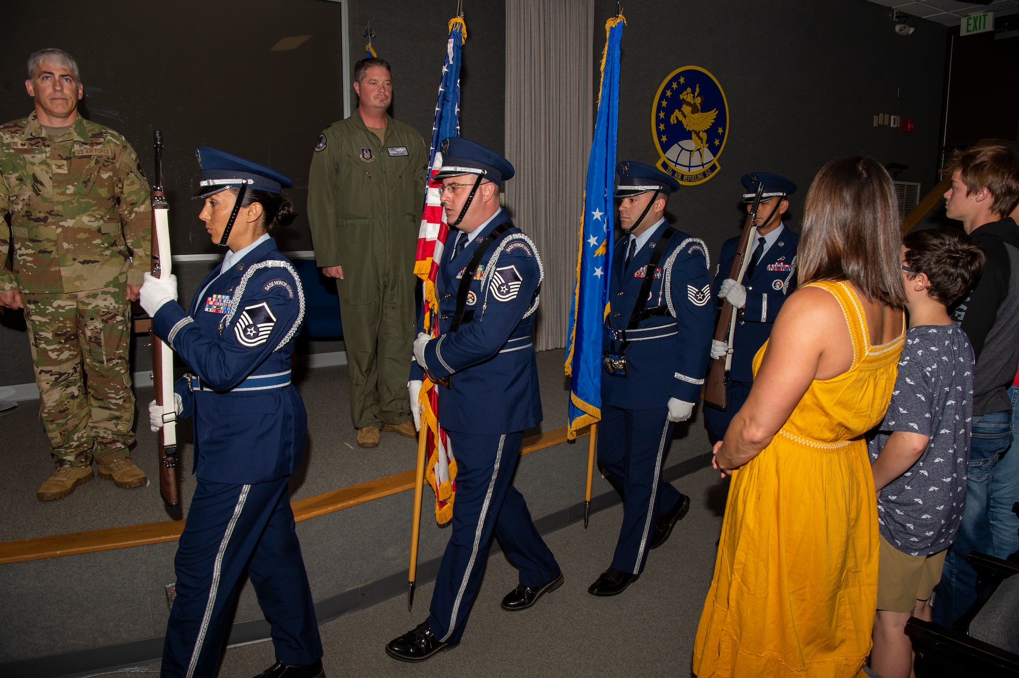 434th Air Refueling Wing Honor Guard march to present the colors during an Assumption of Command ceremony at Gus Grissom Hall, Grissom Air Reserve Base, Ind., May 15, 2022. During the ceremony Lt. Col. David Curl Jr. took command of the 434th Operations Support Squadron. (U.S. Air Force photo by Staff Sgt. Michael Hunsaker)