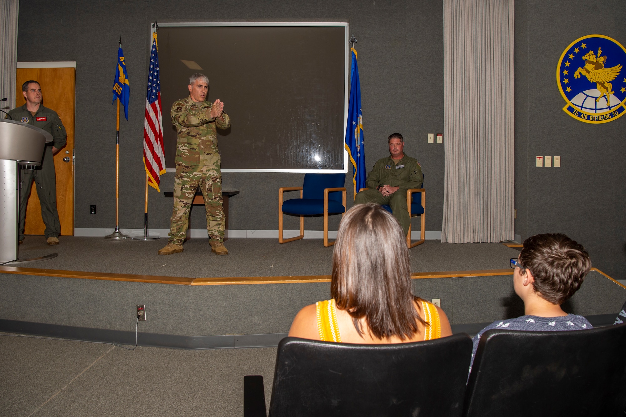 Col. Douglas Perry Jr., 434th Operations Group commander, points at the crowd during an Assumption of command ceremony at Gus Grissom Hall, Grissom Air Reserve Base, Ind., May 15, 2022. Perry presided over the ceremony in which Lt. Col. David Curl Jr. assumed command of the 434th Operations Support Squadron. (U.S. Air Force photo by Staff Sgt. Michael Hunsaker)