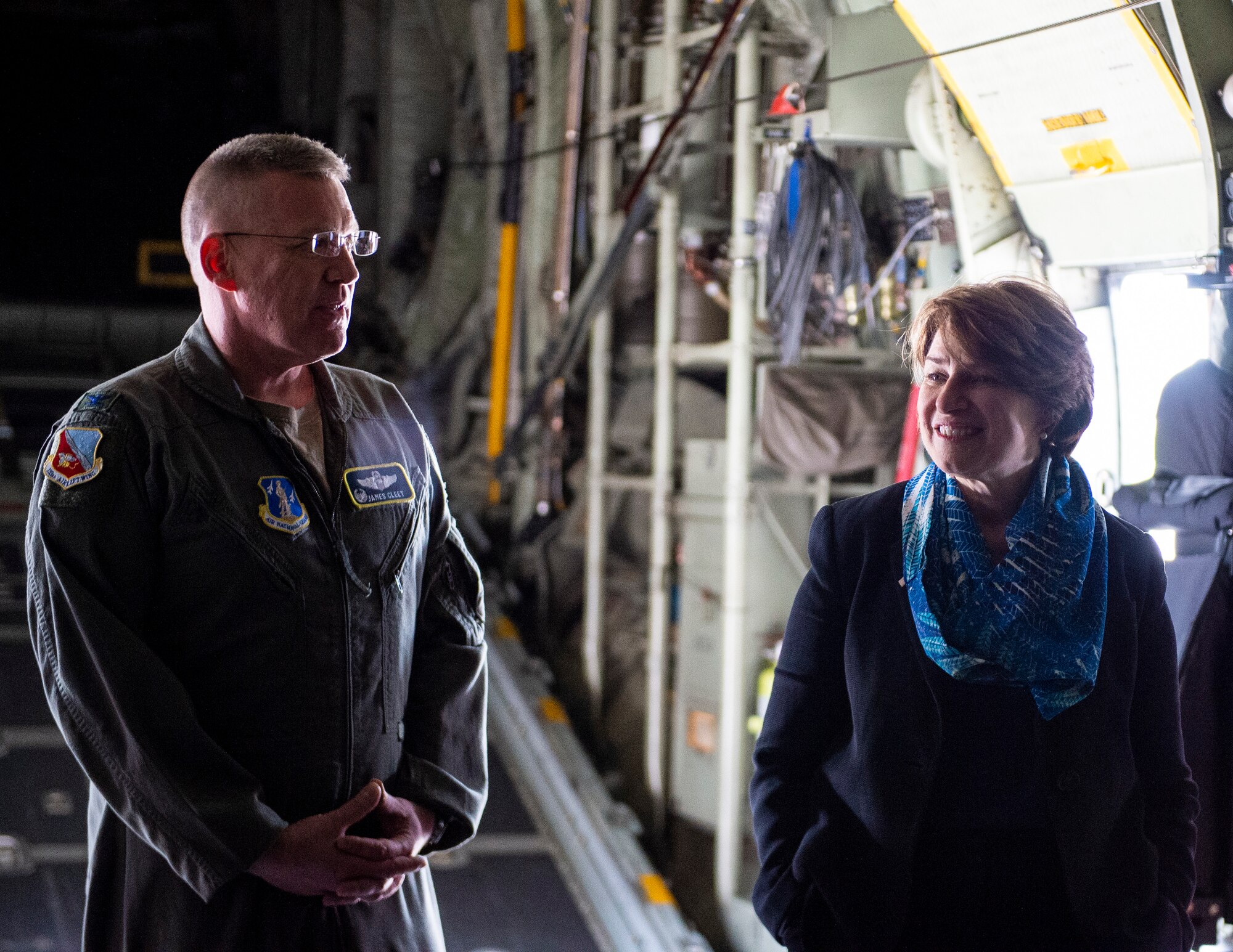 U.S. Air Force Col. James Cleet, Commander, 133rd Airlift Wing and U.S. Sen. Amy Klobuchar, D-Minn., discuss the eight-bladed propeller upgrade to the C-130 in St. Paul, Minn., May 22, 2022.