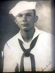 Official headshot of Michael J. Swierc, who enlisted in the Coast Guard on Aug. 11, 1942, and trained as a motor machinist’s mate before deploying overseas for the first wave of the D-Day invasion. Swierc, who turned 100 years old on Nov. 6, 2021, received the Bronze Star Medal for helping save 126 Allied troops from drowning in the English Channel on June 6, 1944. (U.S. Coast Guard photo, courtesy Pam Manka)