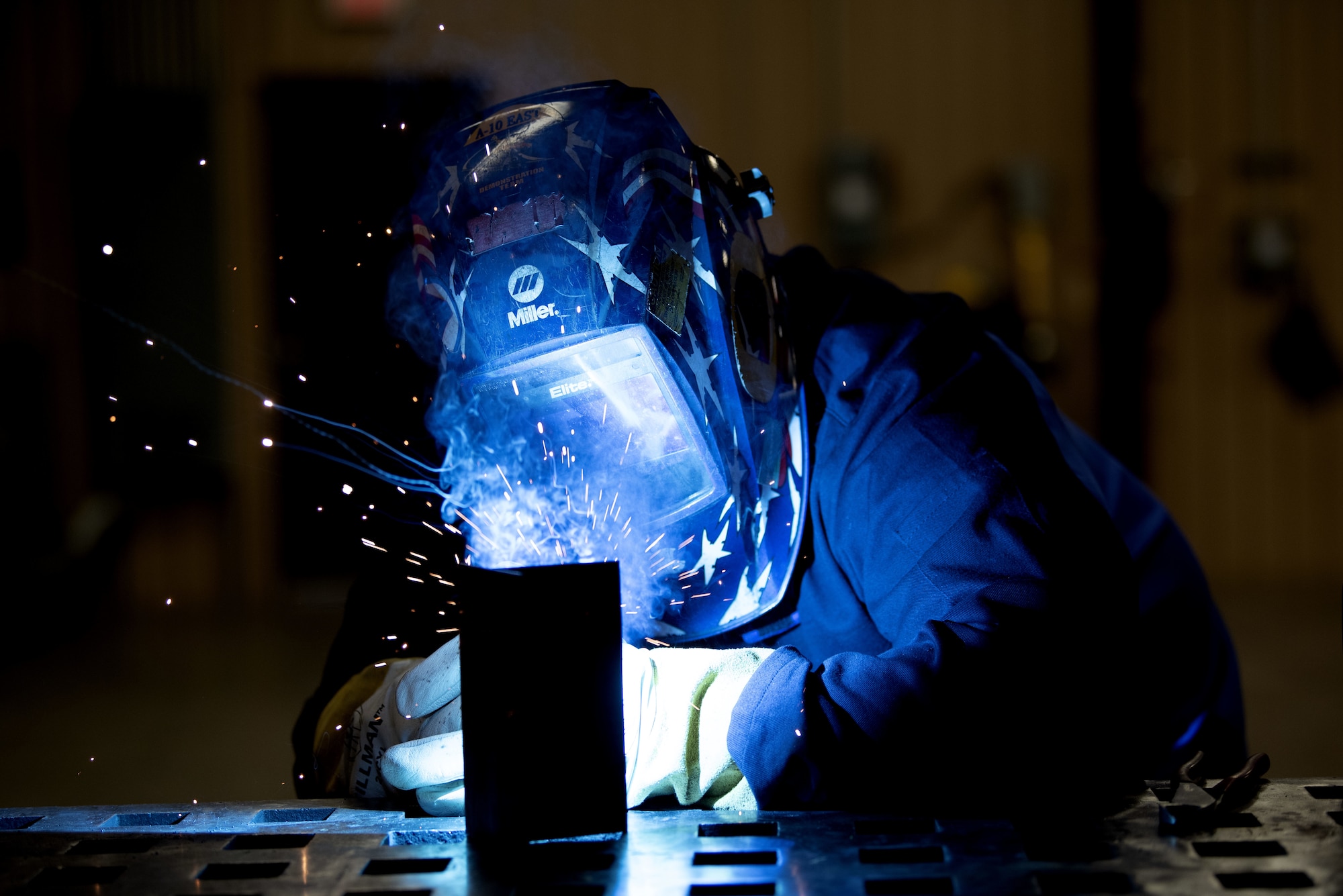 Josh Crutchfield, a civilian contractor for the 8th Aircraft Maintenance Unit, welds pieces of metal together, May 18, 2022, on Holloman Air Force Base, New Mexico.