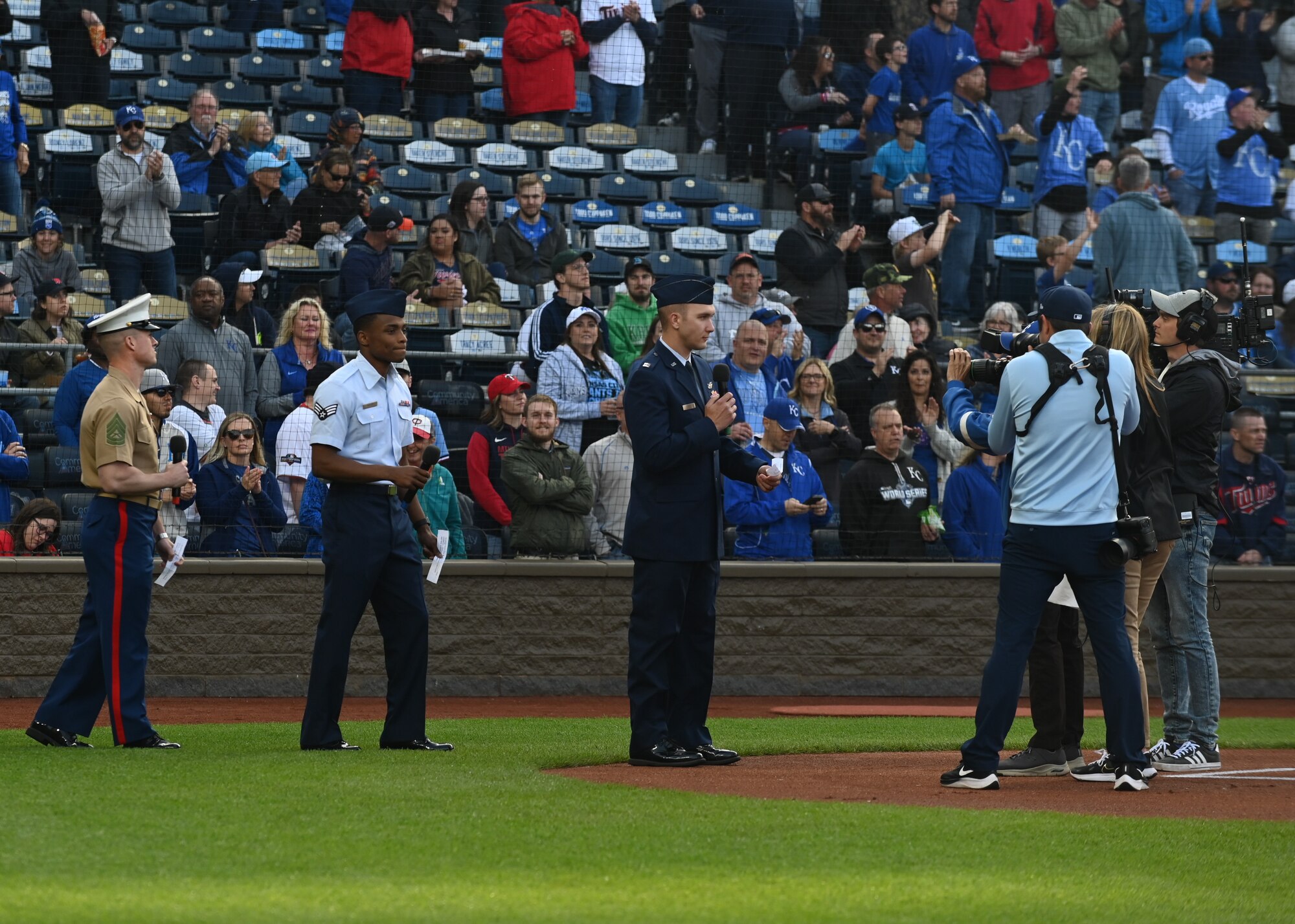 Members of Team Whiteman announce the Kansas City Royals starting lineup.