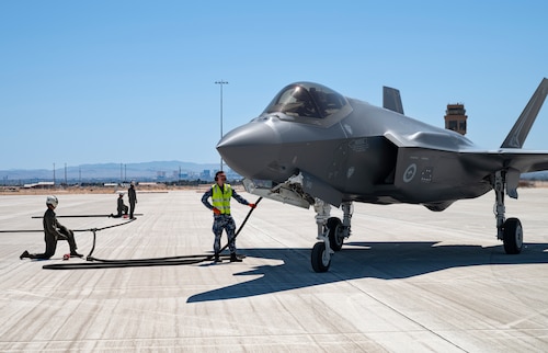 U.S. Marines and Royal Australian Air Force (RAAF) members work together to refuel a RAAF F-35A during Forward Area Refueling Point (FARP) training during Black Flag 22-1 at Nellis AFB, May 13, 2022.
