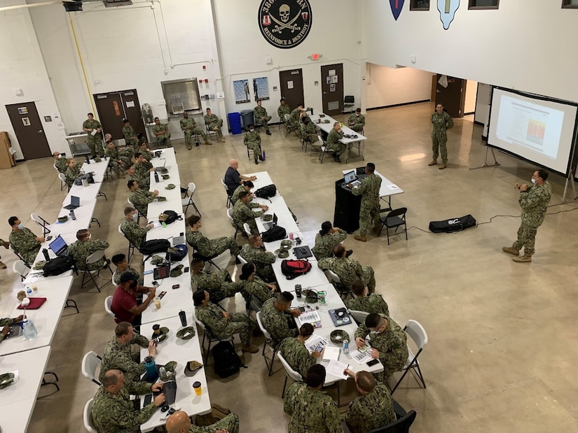 Hospital Corpsman (FMF/EXW) 1st Class (front, right) Travis Morton led the suicide prevention training with PS1 (EXW) Kitara Byerly assisting at Reserve Center Austin, Texas, July 11. (Courtesy Photo)