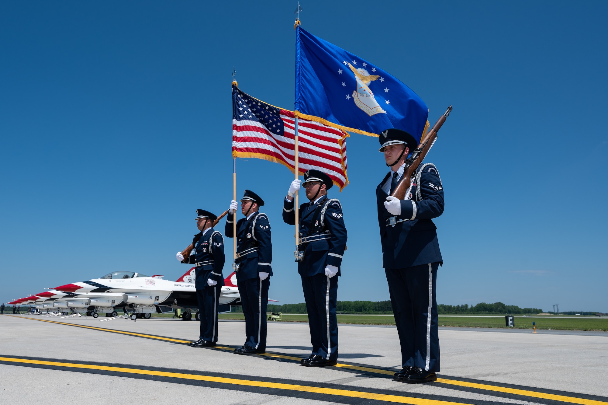 Members of the Dover Air Force Base Honor Guard present the colors during the opening ceremony of the 2022 Thunder Over Dover Airshow, May 22, 2022, at Dover AFB, Delaware. The base opened its gates to more than 75,000 spectators for a free, two-day event to showcase the Air Force and the base’s mission of providing rapid global airlift every day of the year. (U.S. Air Force photo by Mauricio Campino)