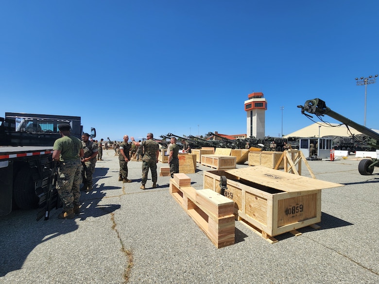 U.S. Marines with the 1st Battalion, 11th Marine Regiment, 1st Marine Division move M777 Howitzer cannons as part of a European Support 2022.