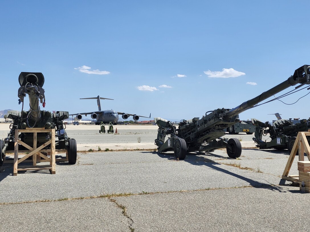 M777 Howitzer cannons at March Air Reserve Base, California, on April 21, 2022 waiting to be sent to European Support 2022 operations. The United States has now committed more than $3.2 billion in security assistance to Ukraine since the beginning of the Biden Administration, including approximately $2.6 billion since the beginning of Russia's unprovoked invasion on February 24 (U.S. Air Force photo by Wendy Day, 452 Air Mobility Wing/ Public Affairs).