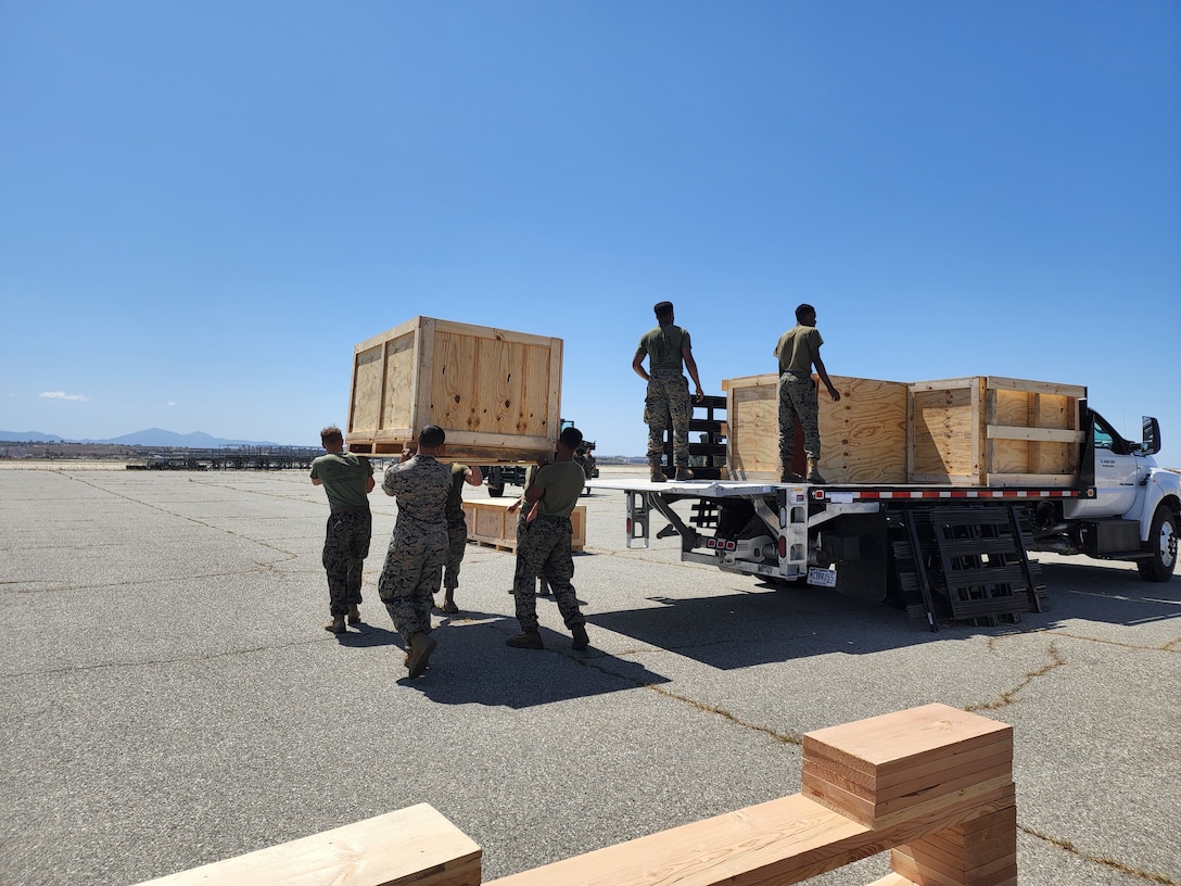 U.S. Marines with the 1st Battalion, 11th Marine Regiment, 1st Marine Division move M777 Howitzer cannons as part of a European Support 2022.