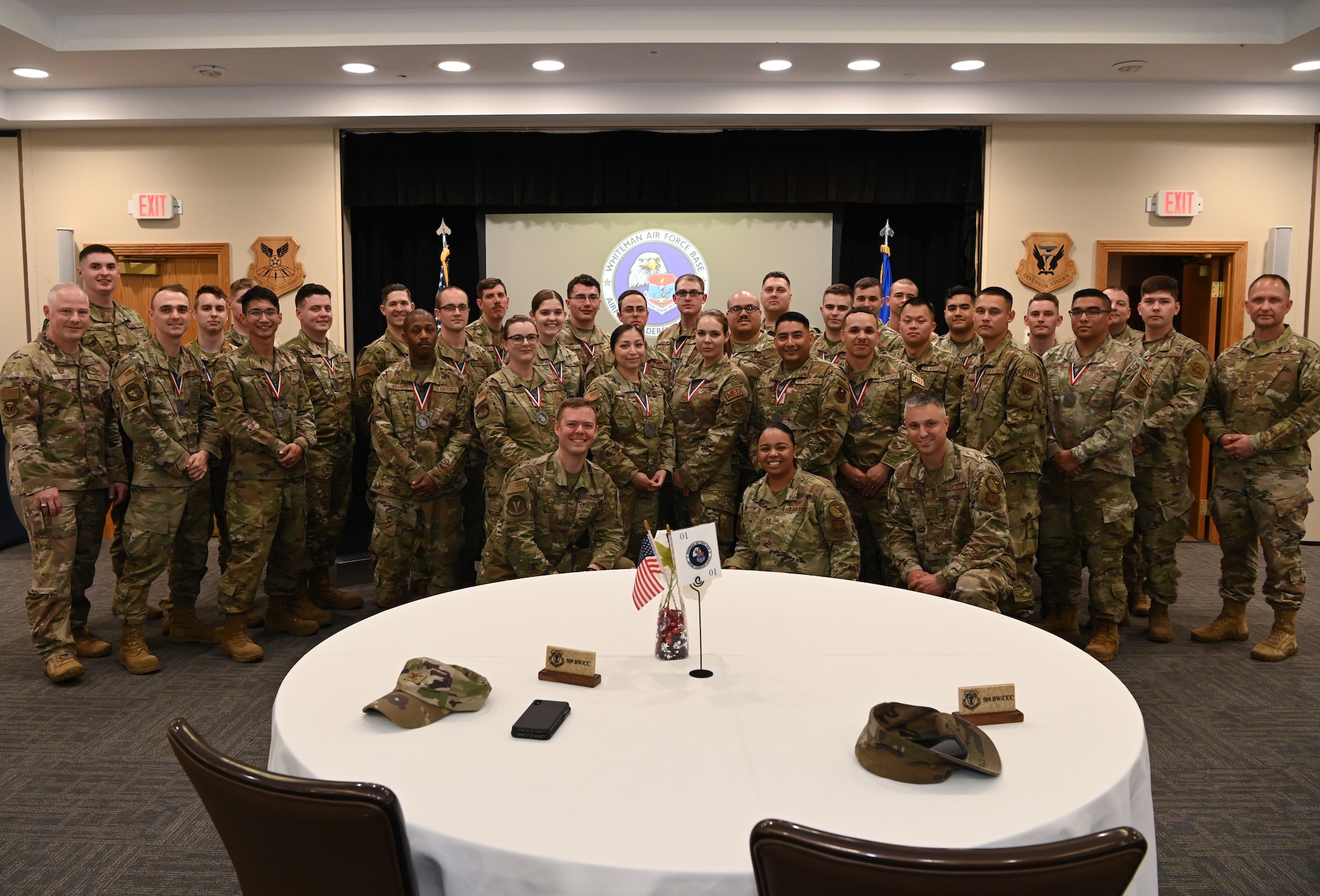 Graduates of Airman Leadership School Class 22-D pose for a group shot at Whiteman Air Force Base, May. 19, 2022. ALS is a five week course meant to prepare Airmen in being military supervisors. (U.S. Air Force photo by Airman 1st Class Joseph Garcia)