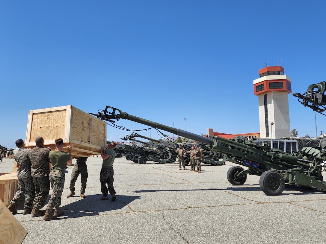 M777 Howitzer cannons at March Air Reserve Base, California, on April 21, 2022 waiting to be sent to European Support 2022 operations. The United States has now committed more than $3.2 billion in security assistance to Ukraine since the beginning of the Biden Administration, including approximately $2.6 billion since the beginning of Russia's unprovoked invasion on February 24 (U.S. Air Force photo by Wendy Day, 452 Air Mobility Wing/ Public Affairs).