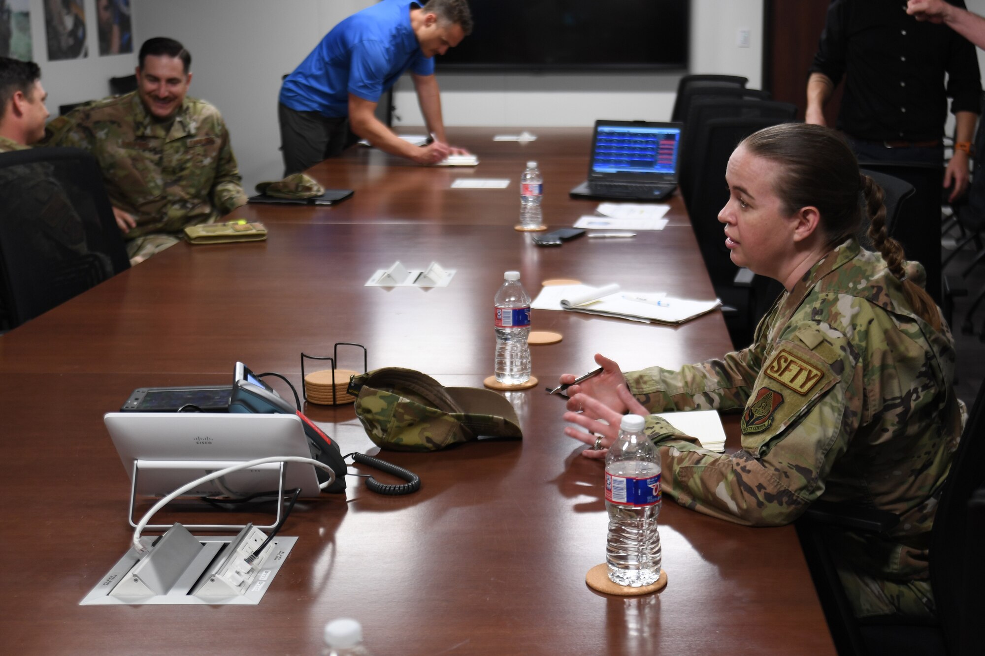 Master Sgt. Sarah Lenker briefs at the Special Warfare Training Wing