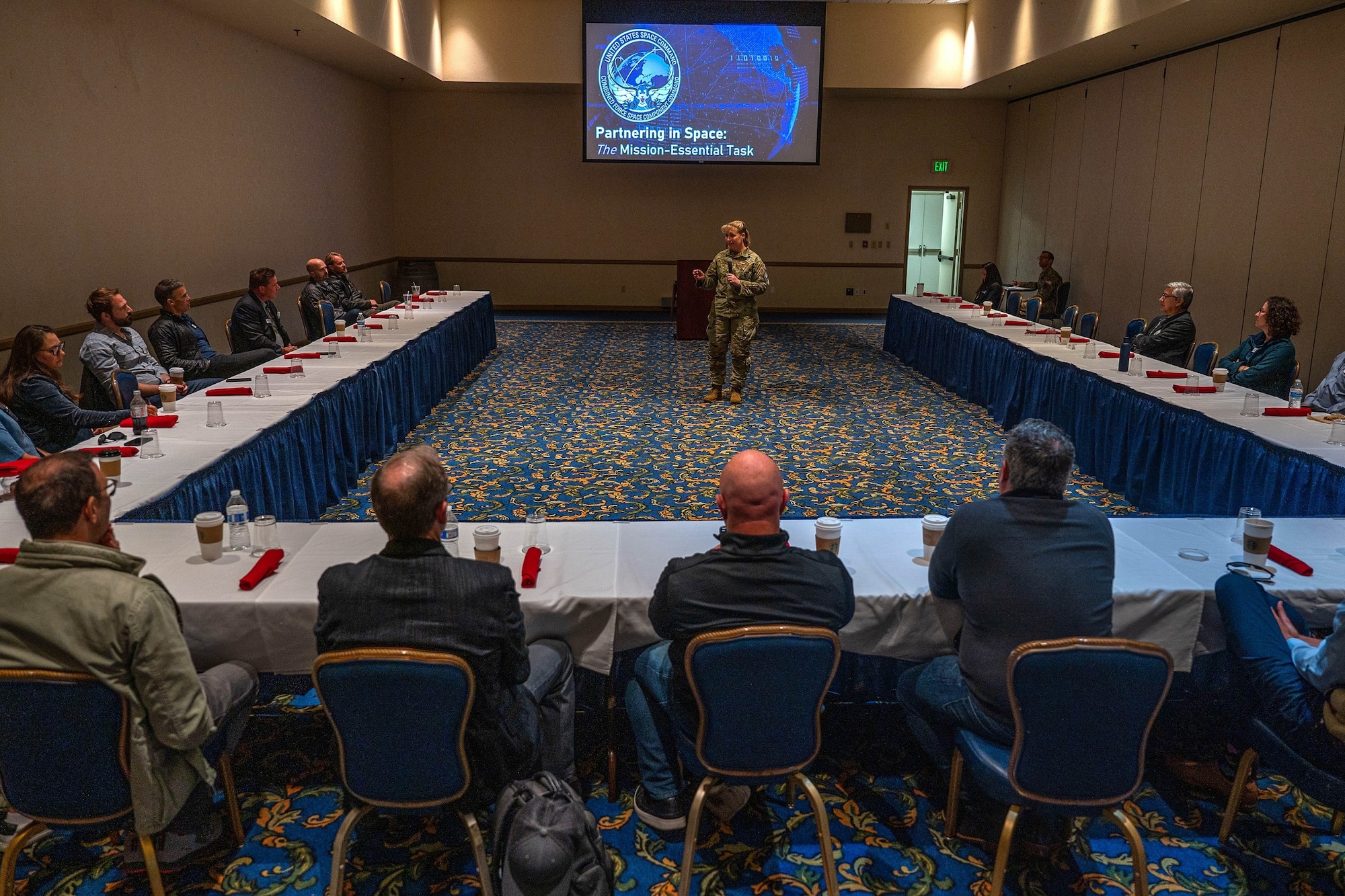 U.S. Space Force Maj. Gen. DeAnna Burt, Combined Force Space Component Command (CFSCC) commander and U.S. Space Operations Command deputy commander, speaks to members of the Santa Barbara Young Presidents Organization during their base immersion at Vandenberg Space Force Base, Calif., May 19, 2022. Burt spoke about the CFSCC's mission and how partnerships with commercial industry and other nations is needed for advancements in technology and capabilities to keep pace with our adversaries and provide security of our nation's space assets. (U.S. Space Force photo by Tech. Sgt. Luke Kitterman)