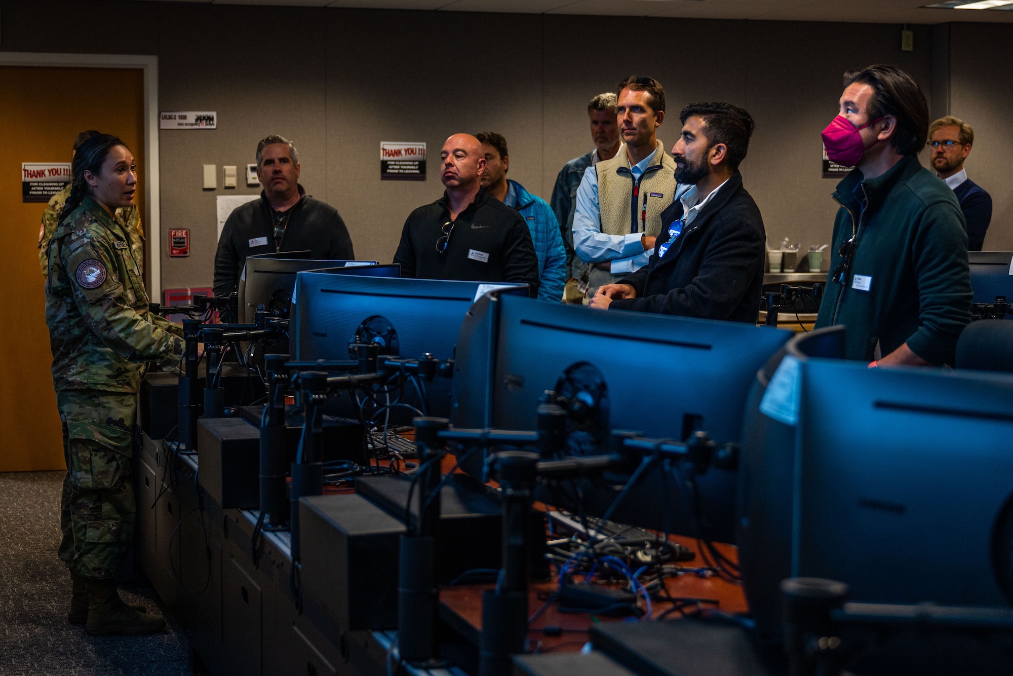 U.S. Space Force 1st Lt. Mary Darras, 2nd Space Launch Squadron SpaceX mission integrator, briefs members of the Santa Barbara Young Presidents Organization (YPO) during their base immersion at Vandenberg Space Force Base, Calif., May 19, 2022. Darras shared experiences on launch days for SpaceX and what goes in to providing oversight in support of Launch Mission Assurance. (U.S. Space Force photo by Tech. Sgt. Luke Kitterman)