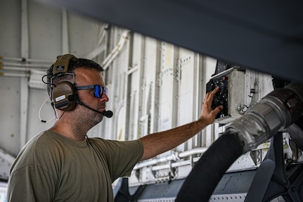 Alabama Air National Guard Master Sgt. Nathan Friday refuels a KC-135 Stratotanker the day before a joint midair refueling exercise with the 117th Air Refueling Wing and Romanian Air
Force in Bucharest, Romania, May 16, 2022. The Alabama Guard and Romania are partners under the Department of Defense National Guard Bureau State Partnership Program.