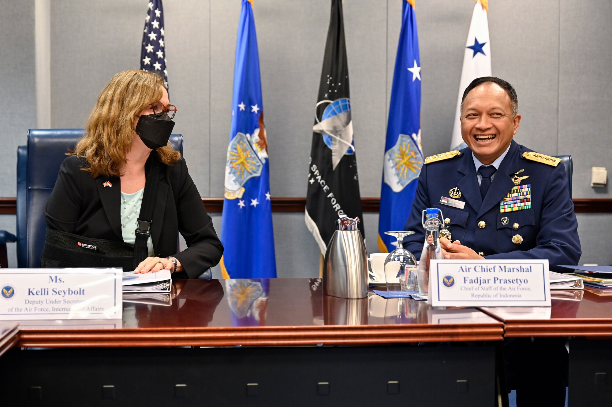 Air Chief Marshal Fadjar Prasetyo, chief of staff of the Indonesian Air Force, speaks with Kelli Seybolt, deputy undersecretary of the Air Force for International Affairs