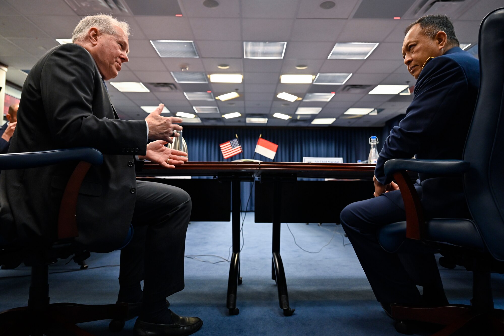 Secretary of the Air Force Frank Kendall, left, speaks with Air Chief Marshal Fadjar Prasetyo.