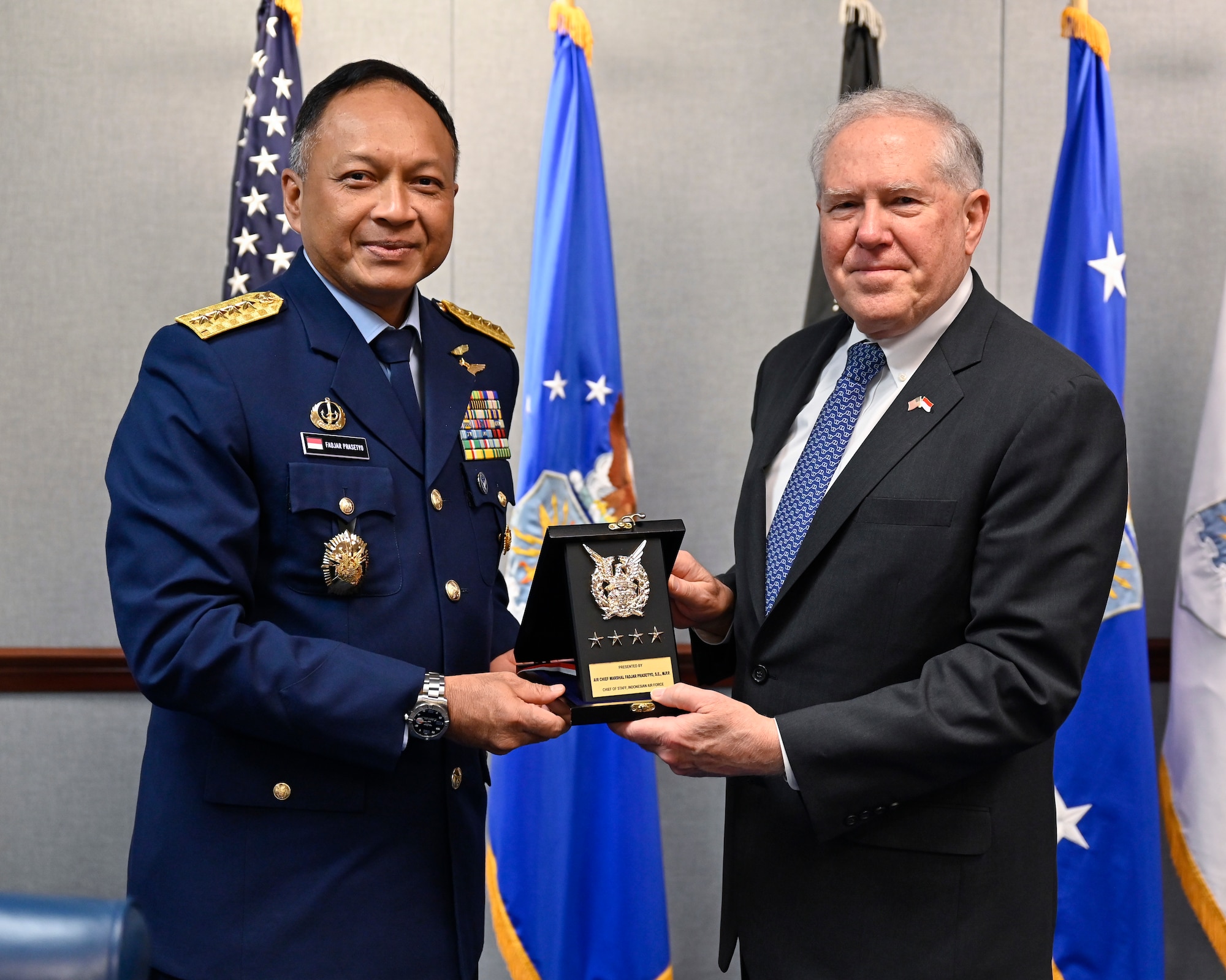 Secretary of the Air Force Frank Kendall, right, poses with Air Chief Marshal Fadjar Prasetyo.