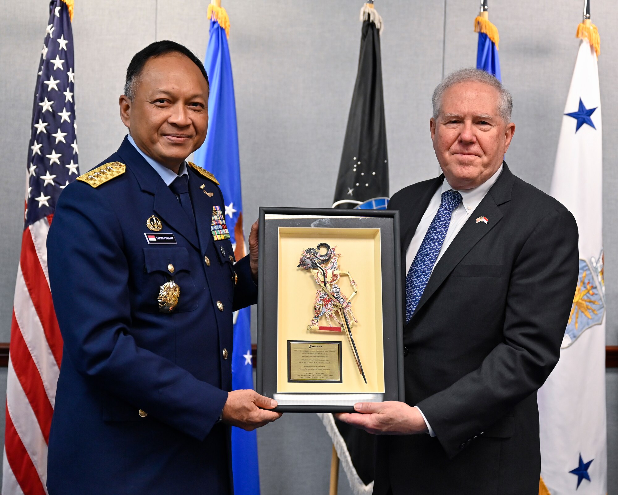 Secretary of the Air Force Frank Kendall, right, poses with Air Chief Marshal Fadjar Prasetyo.