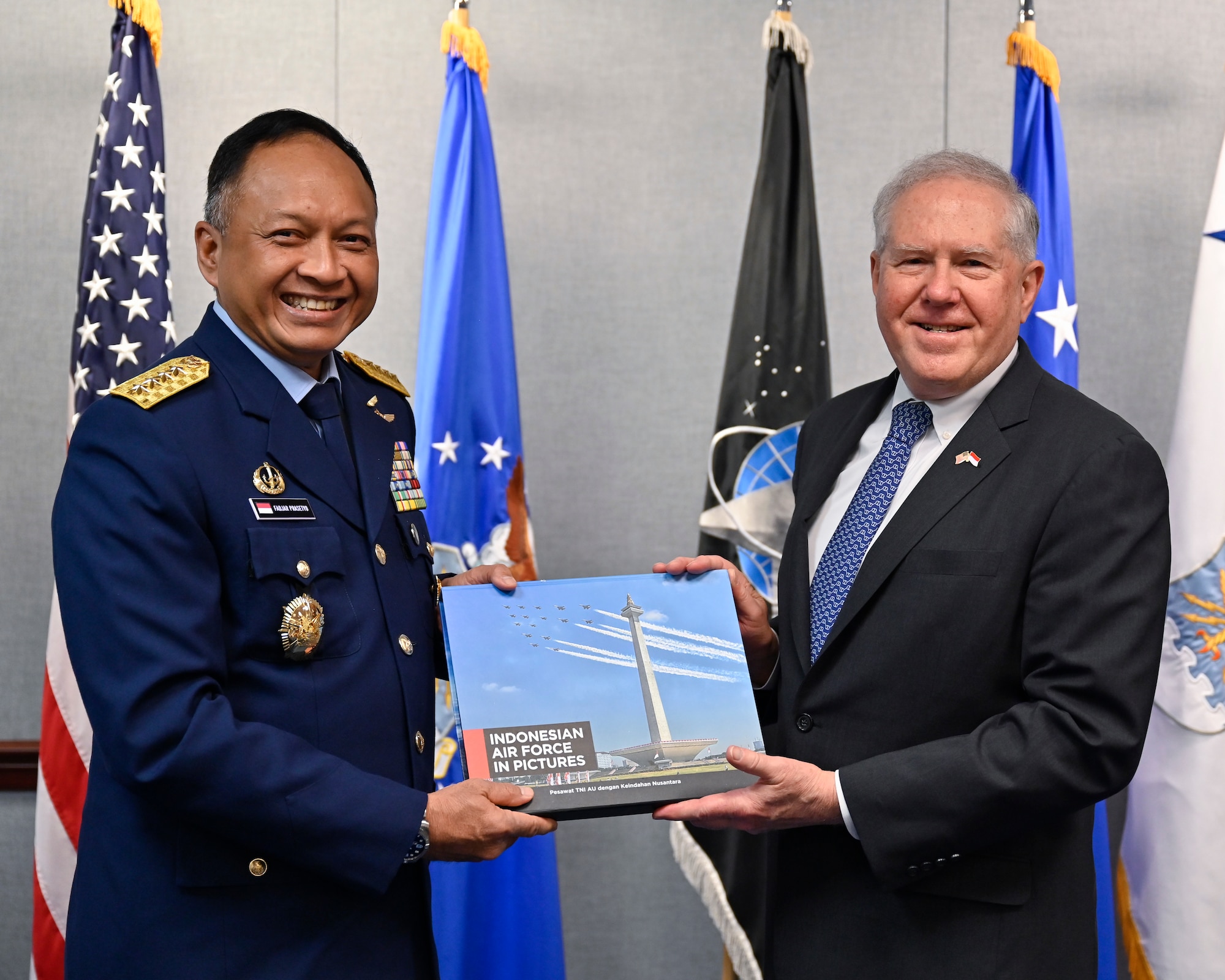 Secretary of the Air Force Frank Kendall, right, poses with Air Chief Marshal Fadjar Prasetyo.