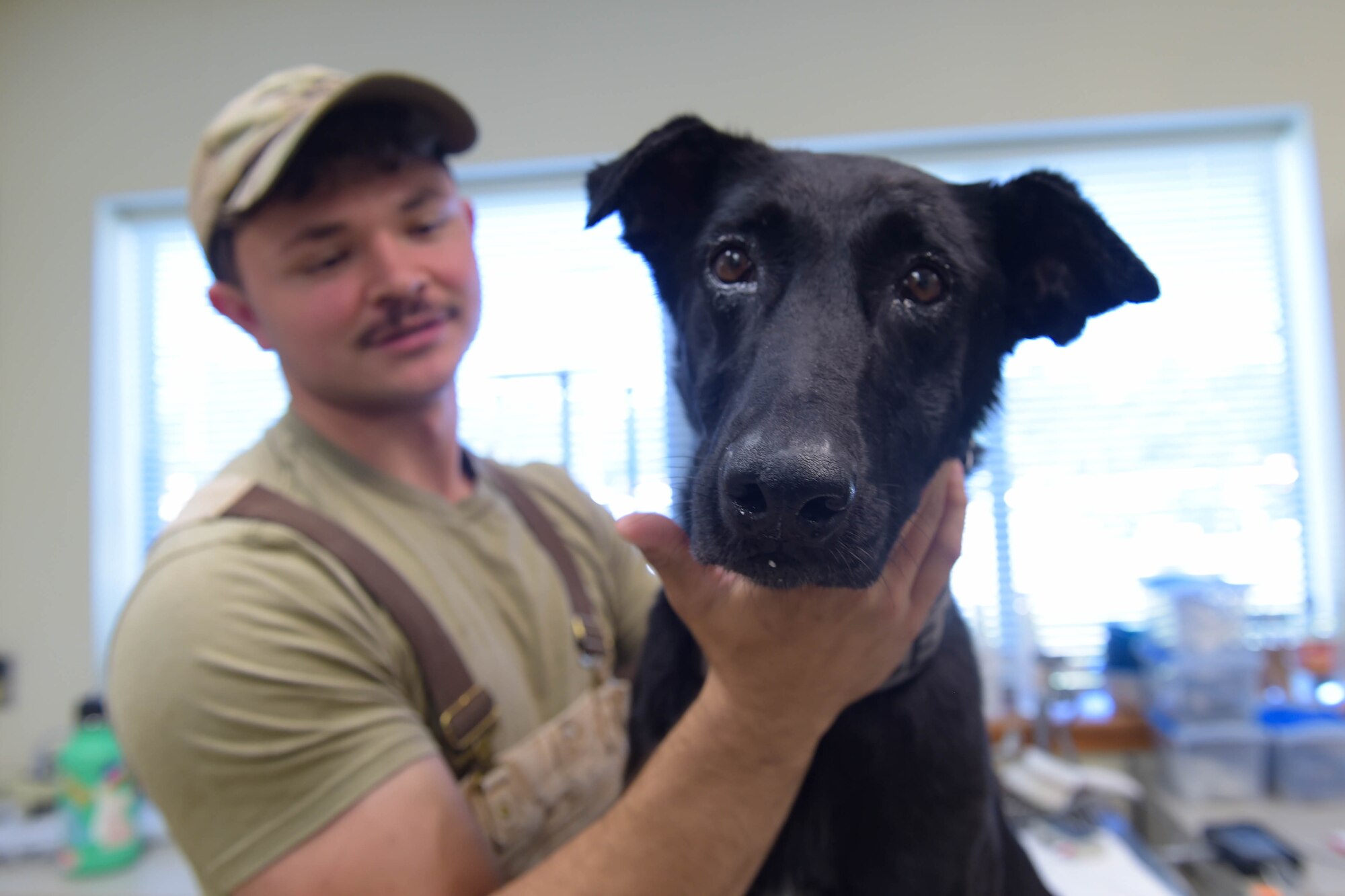 A photo of Airman and dog.