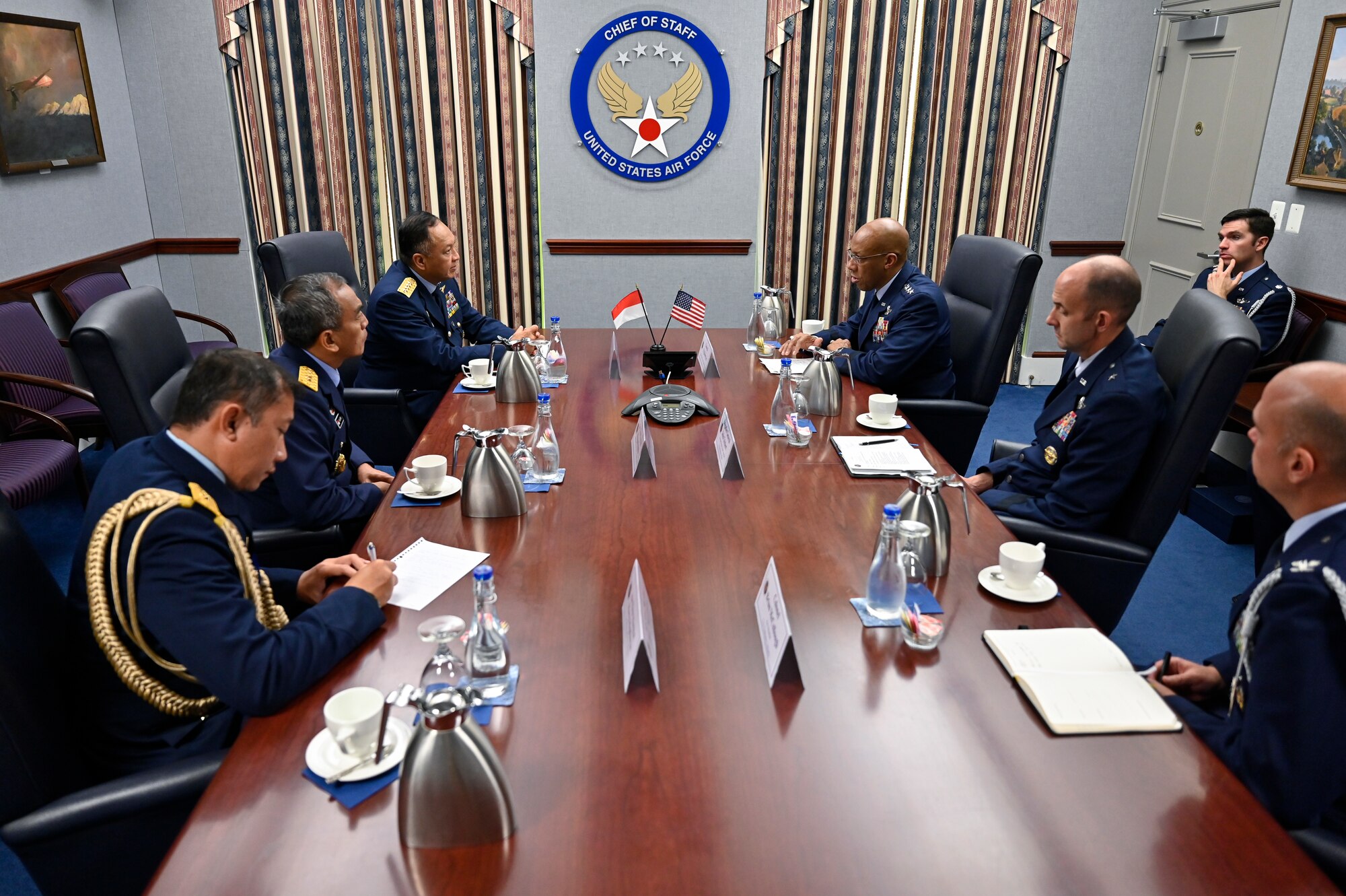 Air Force Chief of Staff Gen. CQ Brown, Jr., center right, speaks with Air Chief Marshal Fadjar Prasetyo, chief of staff of the Indonesian Air Force.