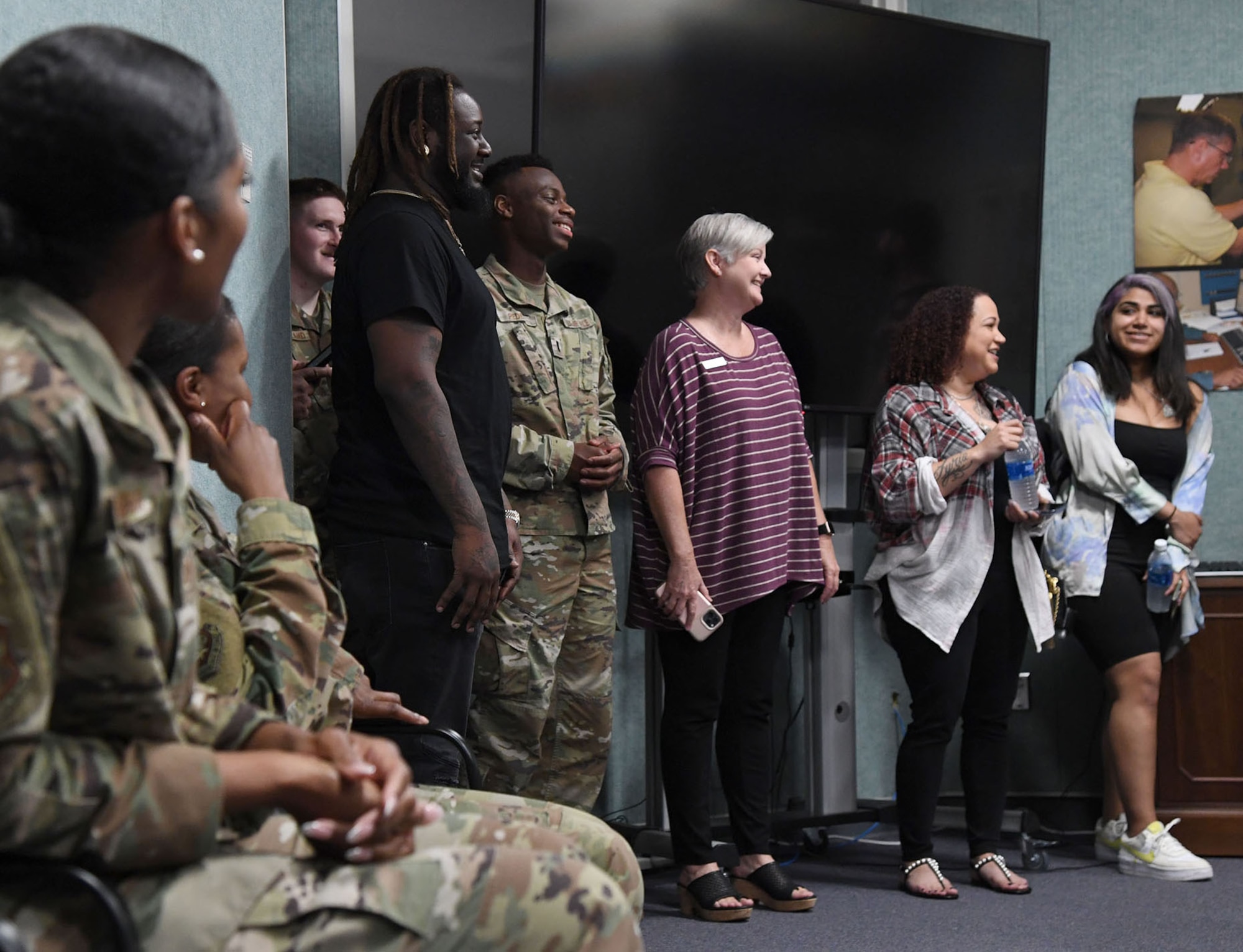 Amber Najm and her husband, T-Pain, an American rapper, tour the 81st Communications Squadron at Keesler Air Force Base, Mississippi, May 19, 2022. Amber served in the Air Force and was assigned to the 81st CS from 2001-2004. (U.S. Air Force photo by Kemberly Groue)