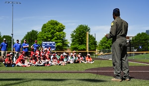 A U.S. Air Force B-2 Spirit pilot speaks to youth baseball teams about diversity at Diversity in the Dugout at the Kansas City Royals Urban Youth Academy, Missouri, May 14, 2022. Diversity in the Dugout aims to provide youth baseball and softball players with mentorship in the Kansas City area. This event is tied to the celebration of Juneteenth, and the objective is to educate kids about diversity in a fun environment. (U.S. Air Force photo by Airman 1st Class Victoria Hommel)