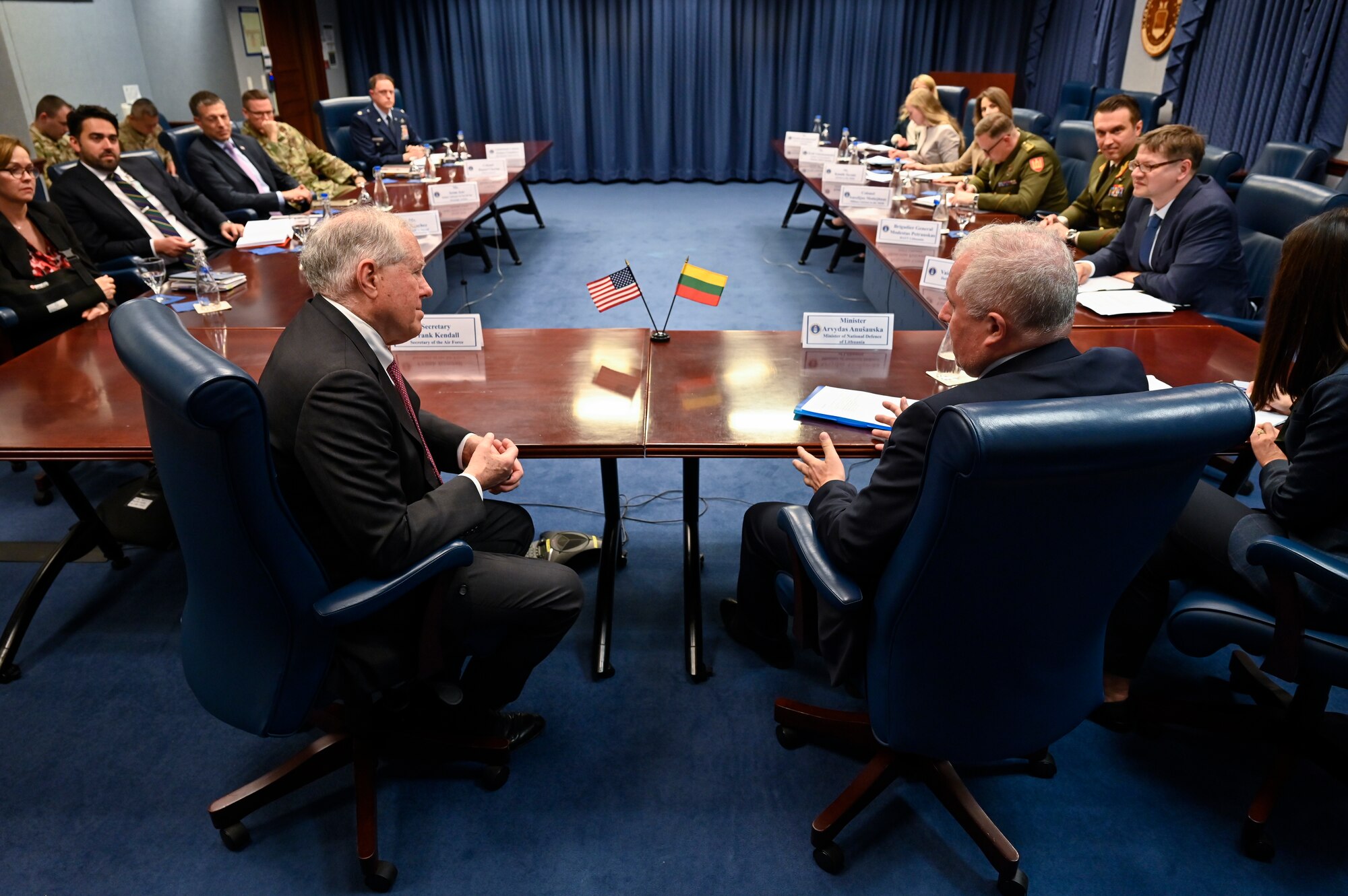 Lithuanian Minister of National Defense Arvydas Anušauskas, right, speaks with Secretary of the Air Force Frank Kendall.