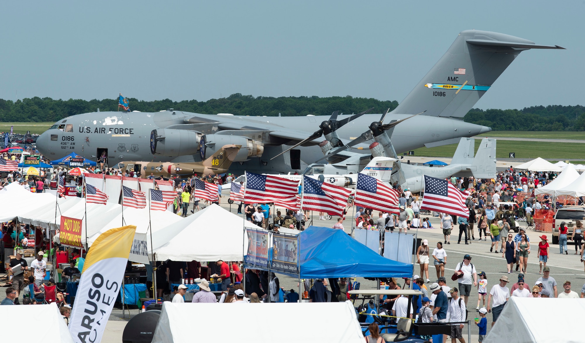 A C-17 Globemaster III, aircraft tail number 60186, that transported hundreds of Afghans during Operation Allies Refuge sits on the flight line during the second day of the 2022 Thunder Over Dover Airshow at Dover Air Force Base, Delaware, May 21, 2022. This airshow was the first since 2019 and was themed “Reunite” as the base welcomed members of the community through the gates. (U.S. Air Force photo by Roland Balik)