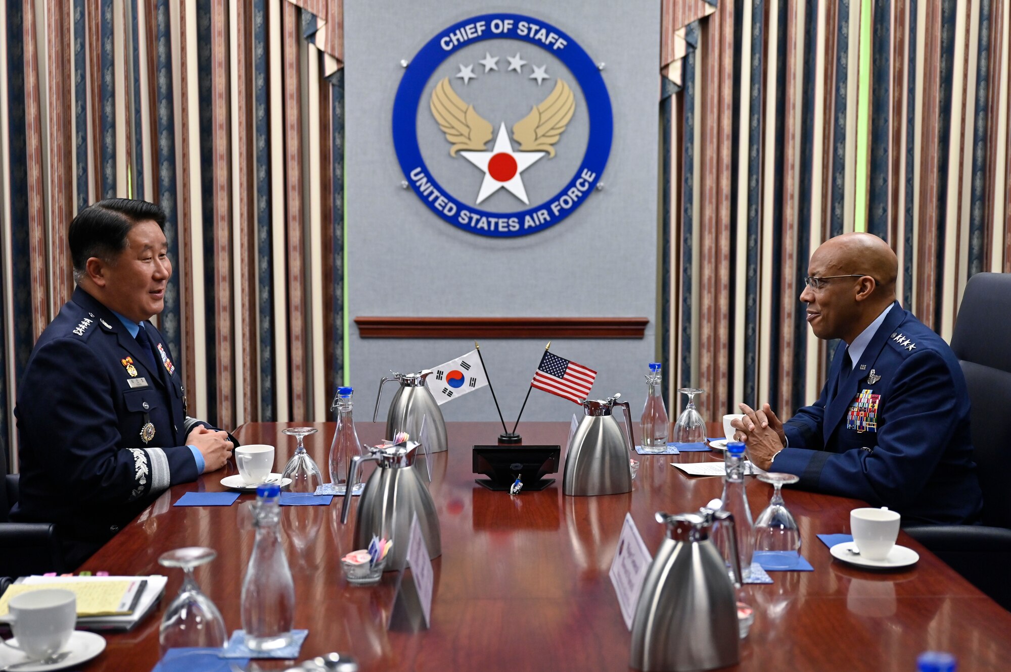 Chief of Staff of the Republic of Korea Air Force Gen. Park Inho, left, speaks with Air Force Chief of Staff Gen. CQ Brown, Jr.