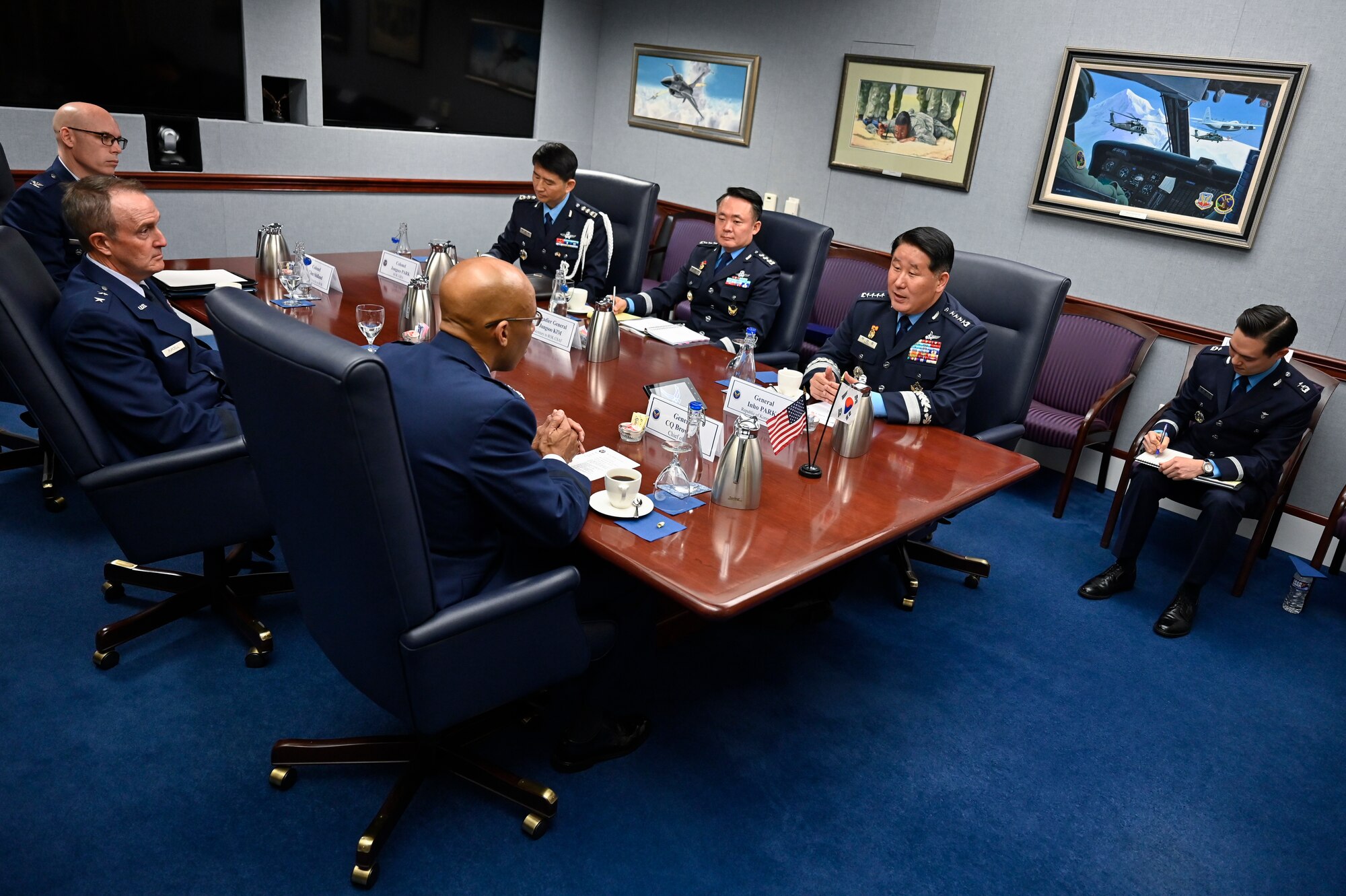 Chief of Staff of the Republic of Korea Air Force Gen. Park Inho, second from right, speaks with Air Force Chief of Staff Gen. CQ Brown, Jr.