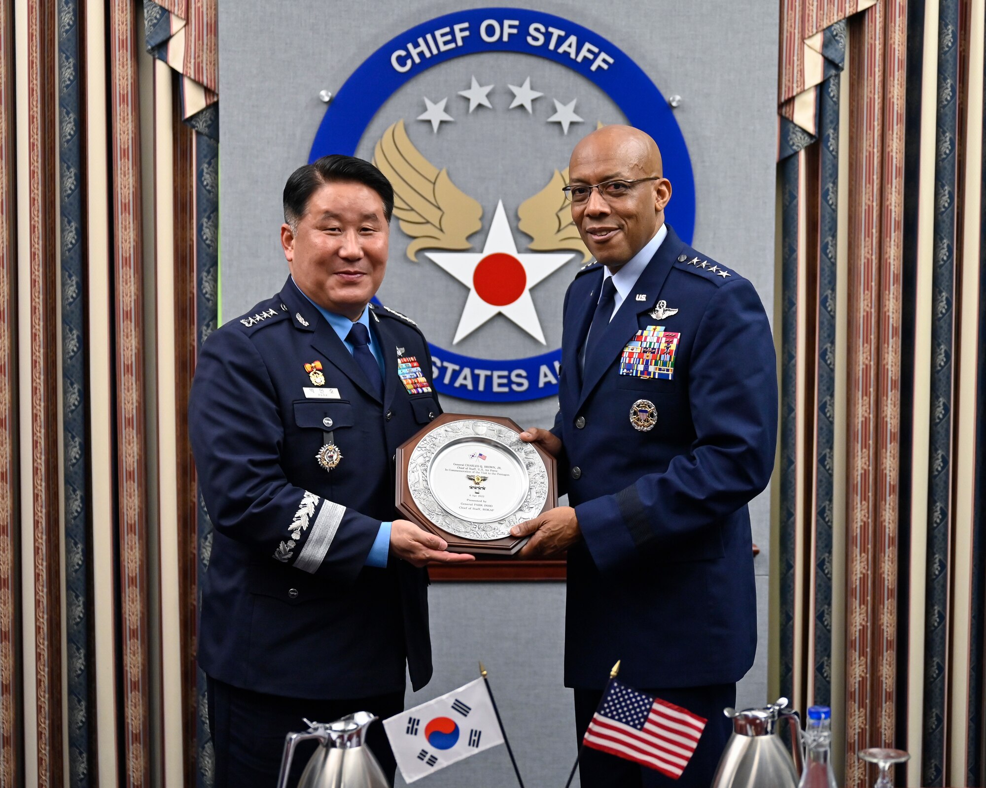 Air Force Chief of Staff Gen. CQ Brown, Jr., right, poses with Chief of Staff of the Republic of Korea Air Force Gen. Park Inho.