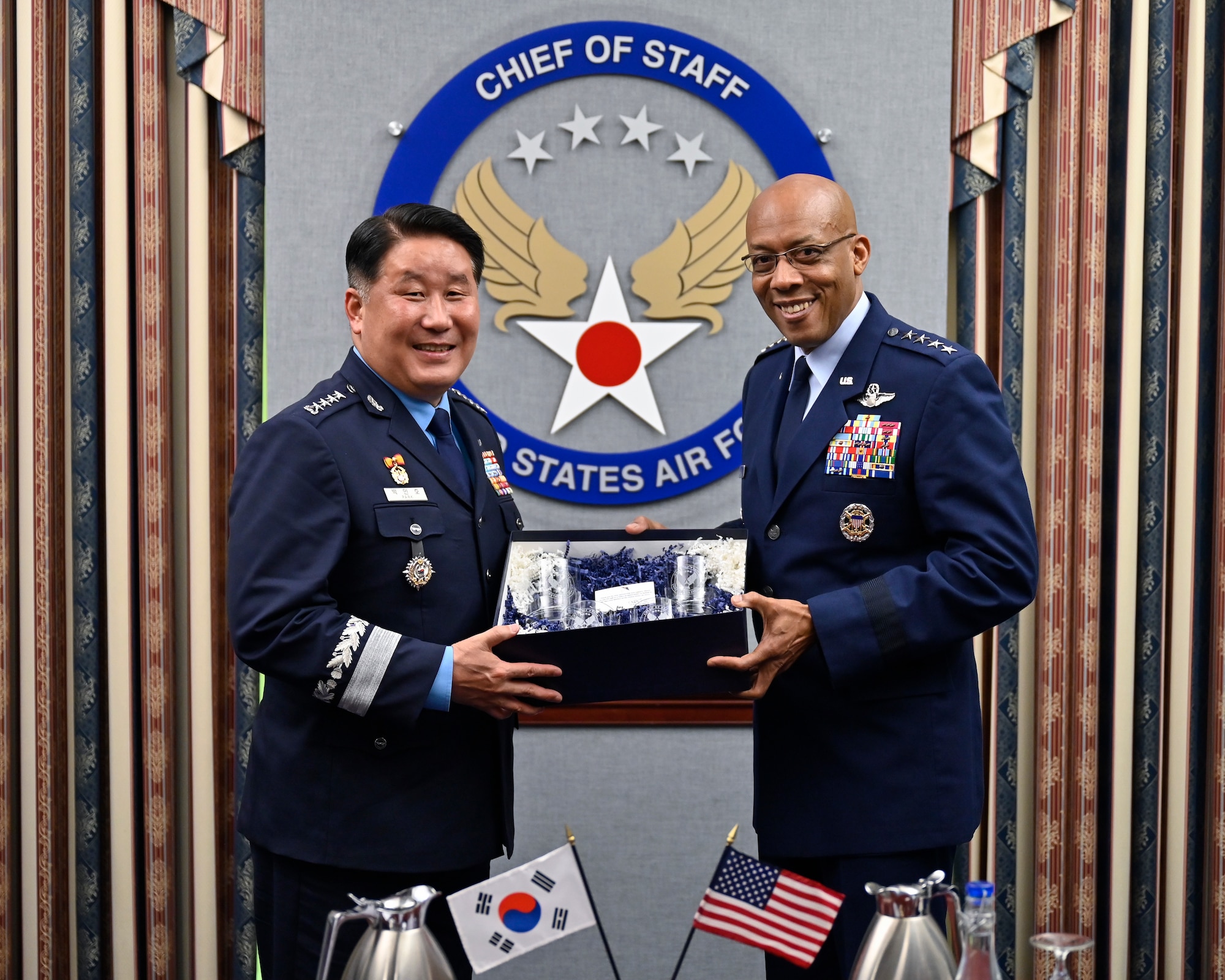 Air Force Chief of Staff Gen. CQ Brown, Jr., right, poses with Chief of Staff of the Republic of Korea Air Force Gen. Park Inho.