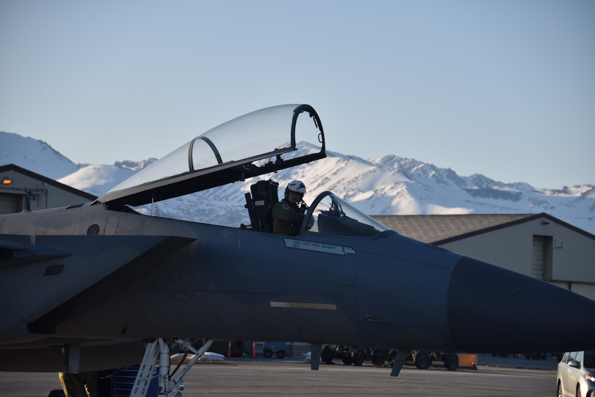 U.S. Air Force Capt. Ben Hale, a pilot assigned to the 194th Fighter Squadron, 144th Fighter Wing, prepares to launch an F-15C Eagle on the flightline of Joint Base Elmendorf-Richardson, Alaska, April 20, 2022, while conducting dissimilar air combat training with the 3rd Wing’s F-22 Raptors.