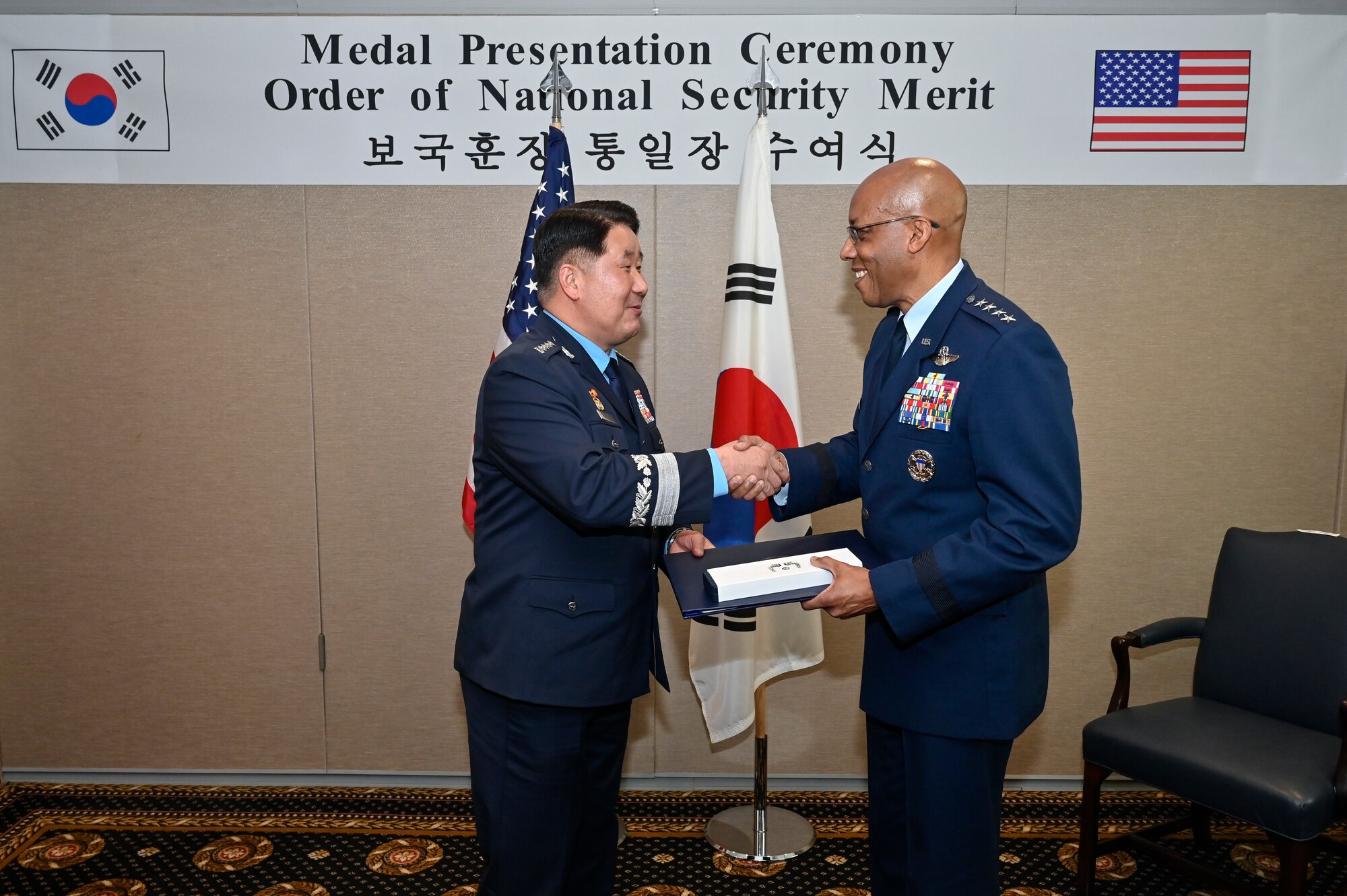 Air Force Chief of Staff Gen. CQ Brown, Jr., right, shakes hands with Chief of Staff of the Republic of Korea Air Force Gen. Park Inho.