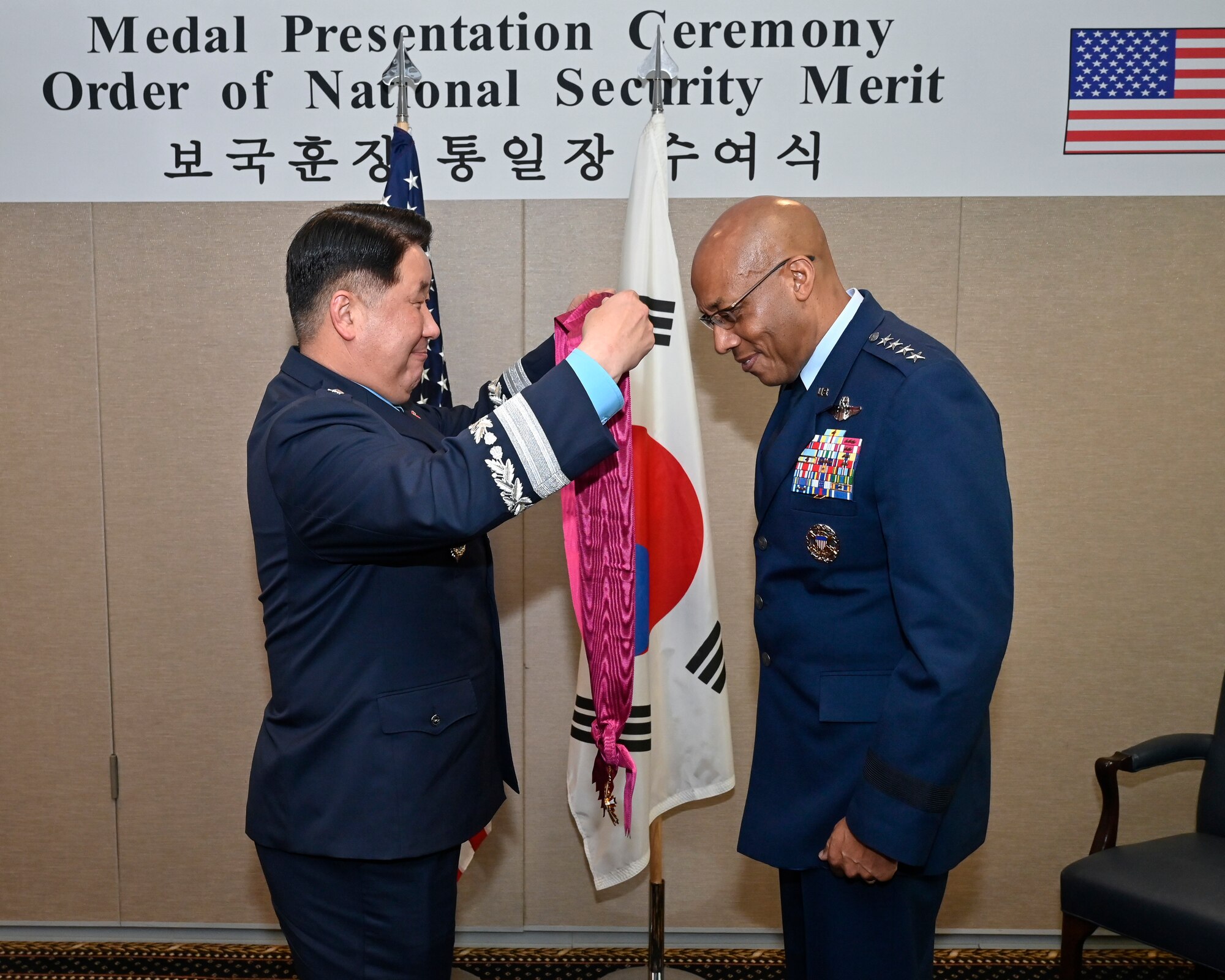 Chief of Staff of the Republic of Korea Air Force Gen. Park Inho presents the Order of National Security Merit, Tong-Il Medal to Air Force Chief of Staff Gen. CQ Brown, Jr.