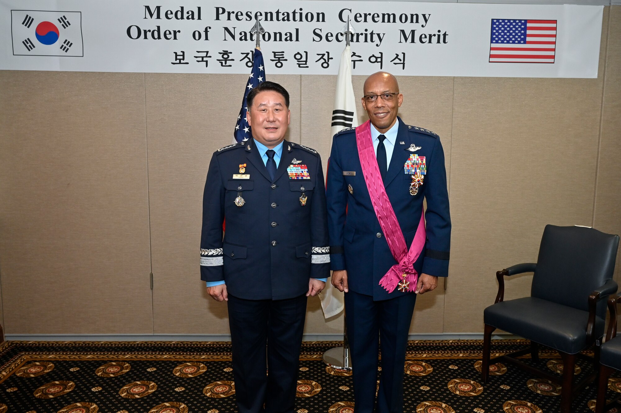 Air Force Chief of Staff Gen. CQ Brown, Jr., right, poses with Chief of Staff of the Republic of Korea Air Force Gen. Park Inho.