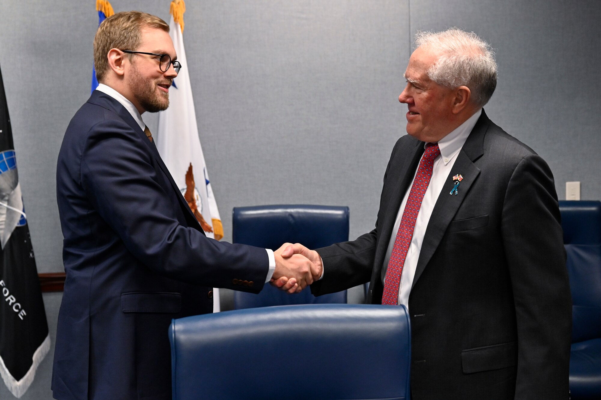 Secretary of the Air Force Frank Kendall, right, greets Norwegian State Secretary Bent-Joacim Bentzen.