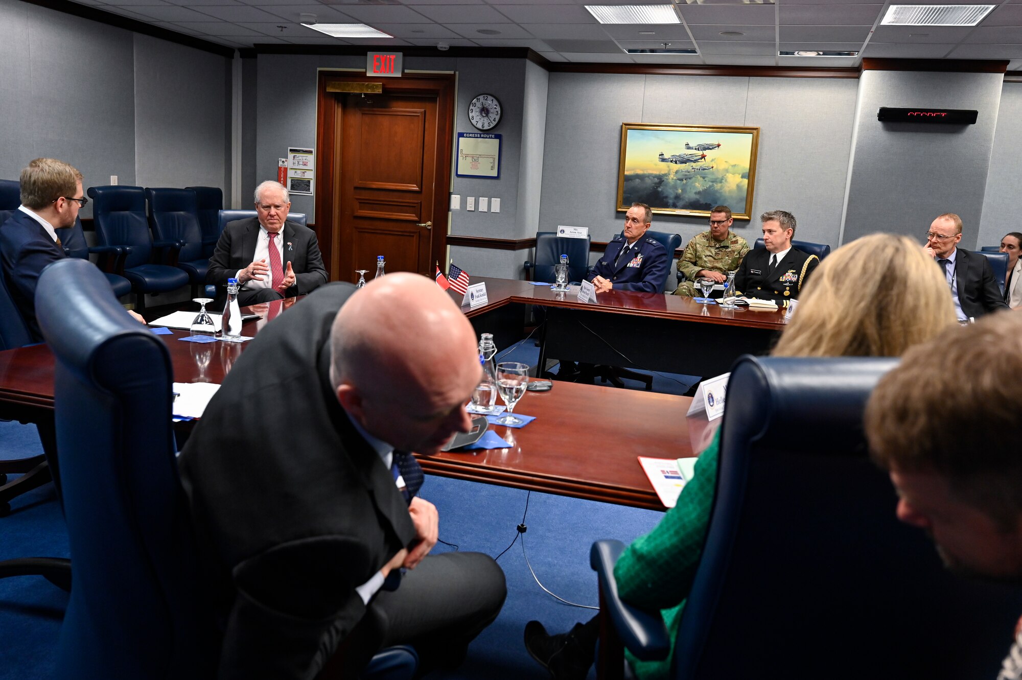 Secretary of the Air Force Frank Kendall, second from left, speaks with Norwegian State Secretary Bent-Joacim Bentzen.