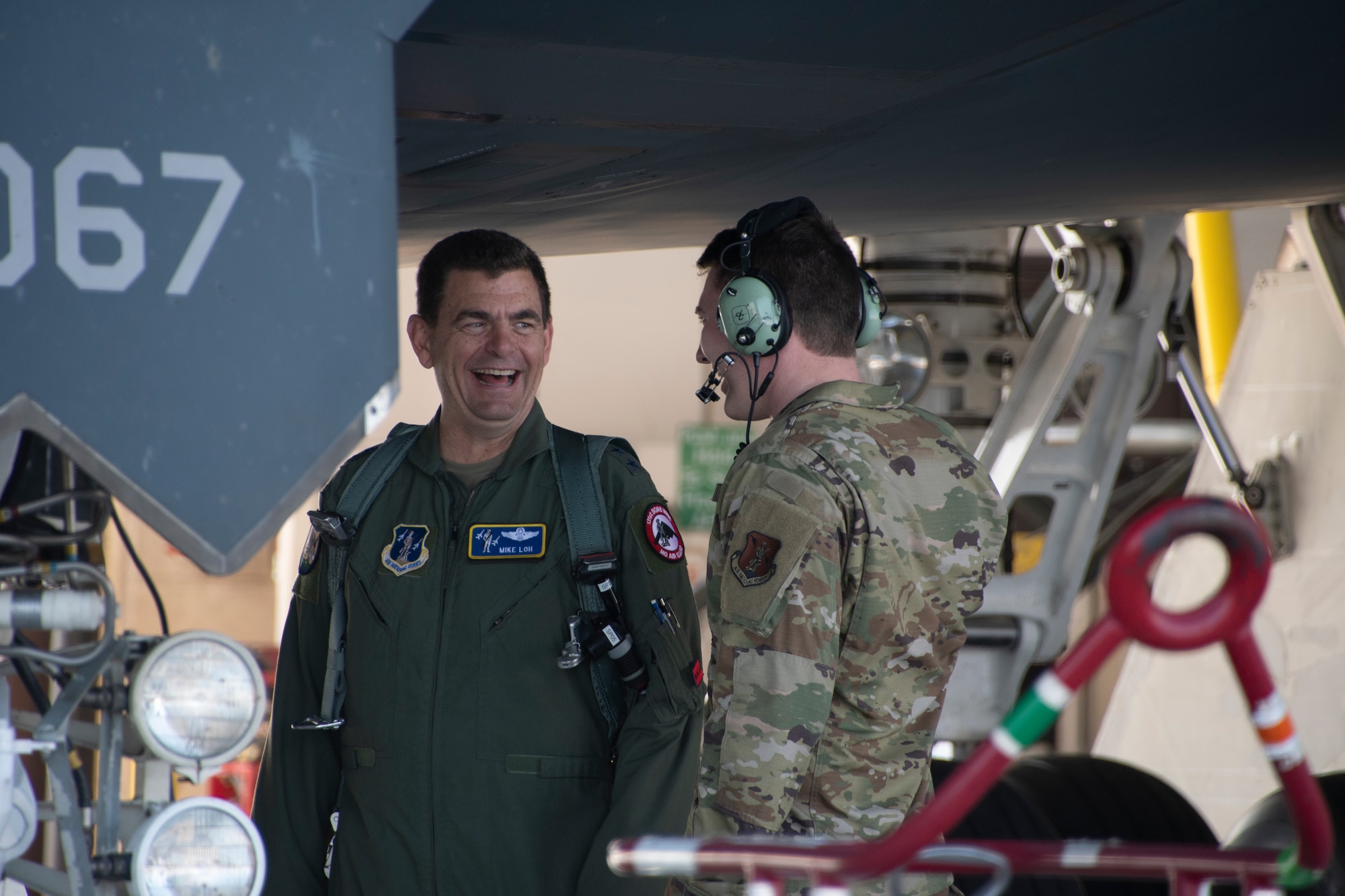 U.S. Air Force Lt. Gen. Michael A. Loh, director, Air National Guard, conducts preflight inspections with Senior Airman Colin Davis, 131st Aircraft Maintenance Squadron crew chief, before a flight at Whiteman Air Force Base, Missouri, May 14, 2022. During his visit Loh greeted and spoke with Airmen from all parts of Whiteman’s total force structure. (U.S. Air National Guard photo by Airman 1st Class Kelly C. Ferguson)