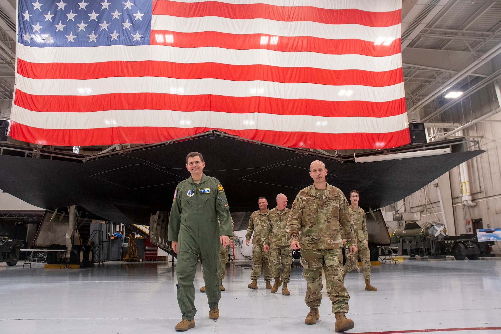 U.S. Air Force Lt. Gen. Michael Loh, director, Air National Guard, views the Weapons Load Trainer during a visit to Whiteman Air Force Base, Missouri, May 13, 2022. Loh visited the Missouri Air National Guard's 131st Bomb Wing to learn about their total force B-2 Spirit stealth bomber mission. (U.S. Air National Guard photo by Master Sgt. John E. Hillier