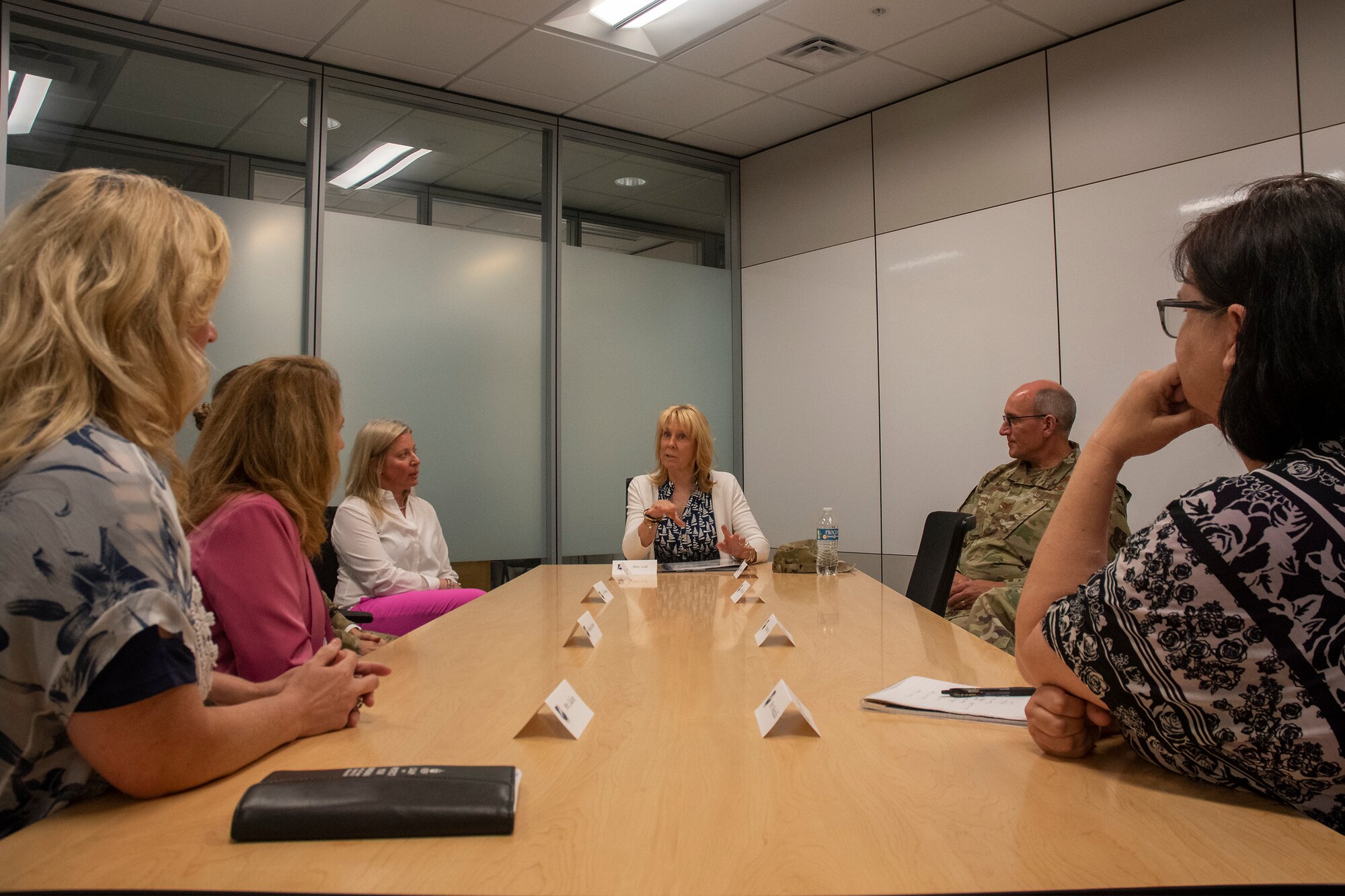 Mrs. Dianne Loh, spouse of Air National Guard Director Lt. Gen. Michael Loh, meets with 131st Bomb Wing leaders and support services personnel during a visit to Whiteman Air Force Base, Missouri, May 14, 2022. Loh spoke with a variety of wing personnel about quality of life issues and ensuring Guard Airmen have access to resources they need. (U.S. Air National Guard photo by Master Sgt. John E. Hillier)