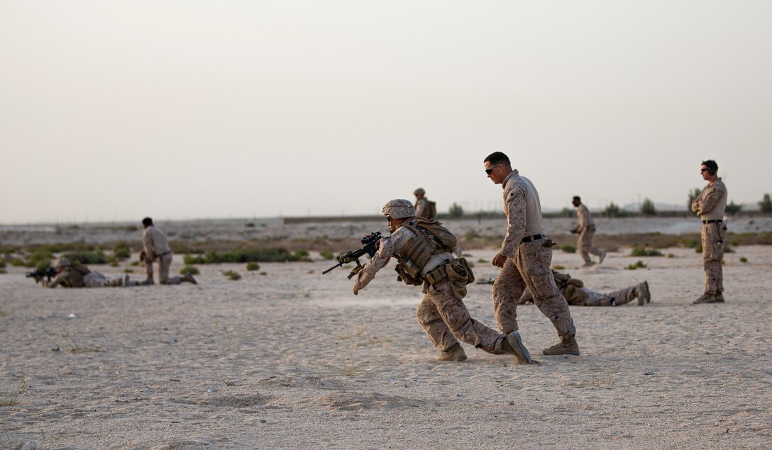 RAS AL QARAIN, Bahrain (May 11, 2022) – U.S. Marines assigned to Fleet Anti-Terrorism Security Team Central Command (FASTCENT) participate in a live fire range during exercise Neon Defender 22 in Bahrain, May 11. Neon Defender is an annual bilateral training event between U.S. Naval Forces Central Command and Bahrain. The exercise focuses on maritime security operations, installation defense and medical response. (U.S. Marine Corps photo by Sgt. Benjamin McDonald)