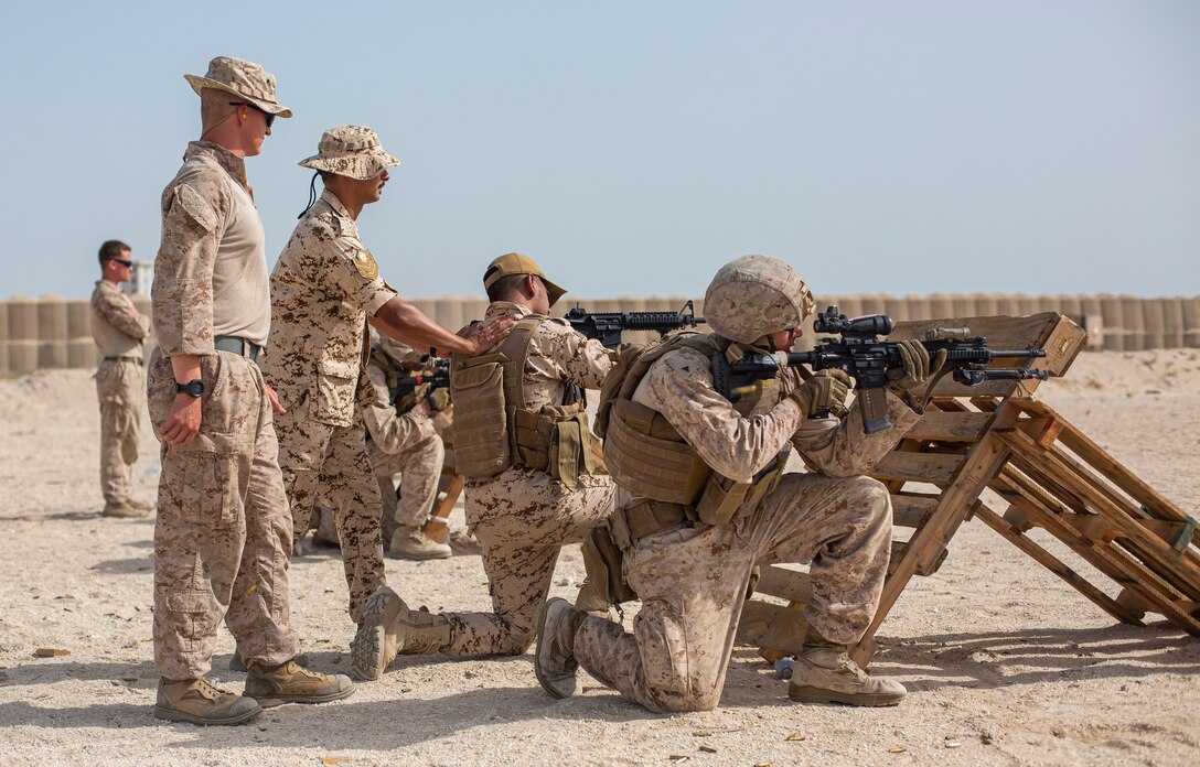 RAS AL QARAIN, Bahrain (May 11, 2022) – U.S. Marines assigned to Fleet Anti-Terrorism Security Team Central Command (FASTCENT) and Royal Bahrain Naval Force Marines participate in a live fire training during exercise Neon Defender 22 in Bahrain, May 11. Neon Defender is an annual bilateral training event between U.S. Naval Forces Central Command and Bahrain. The exercise focuses on maritime security operations, installation defense and medical response. (U.S. Marine Corps photo by Sgt. Benjamin McDonald)